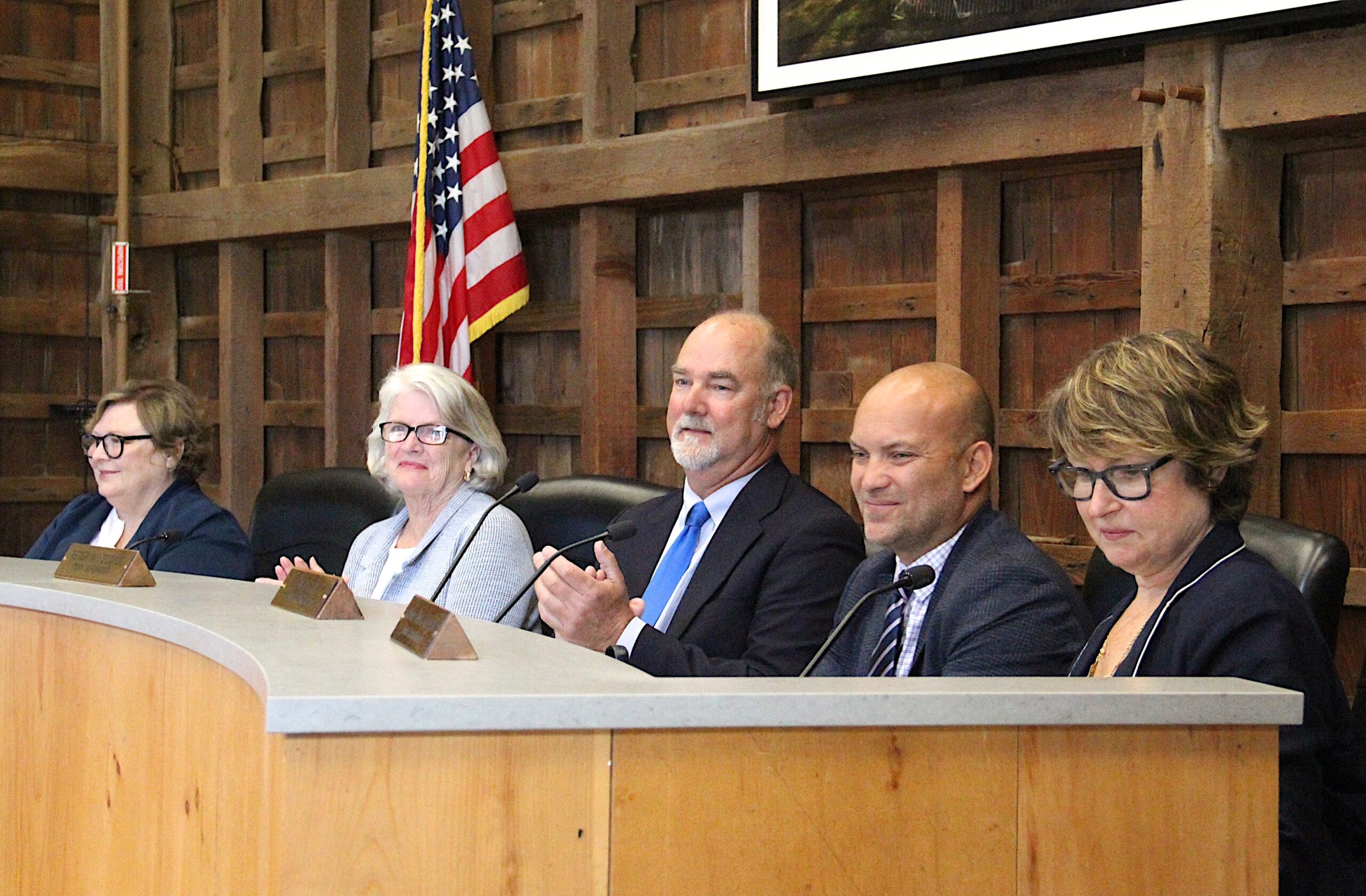 East Hampton Supervisor Peter Van Scoyoc, center, will not seek reelection this year. Councilwoman Kathee Burke-Gonzalez, right, has said she will seek the Democratic Party's nomination to succeed him.