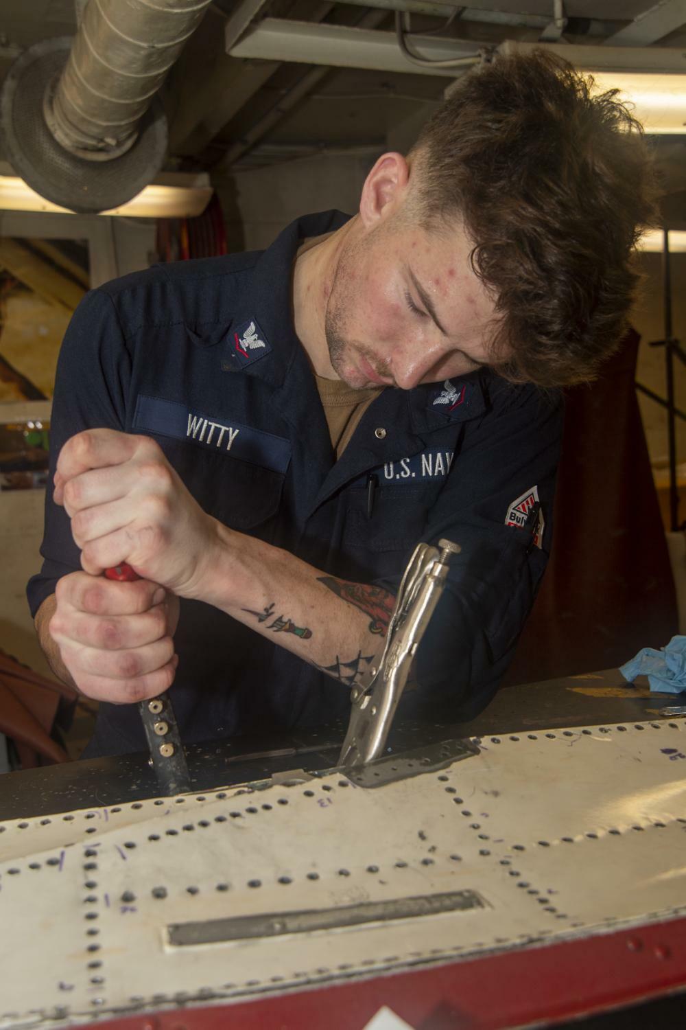 Serving Our Nation 
U.S. Navy Aviation Structural Mechanic 3rd Class Sage Witty from Sag Harbor is serving aboard the aircraft carrier USS Nimitz (CVN 68). Recently he worked on the main landing gear door from an E-2C Hawkeye while aboard the carrier. Nimitz is in 7th Fleet, the U.S. Navy’s largest forward-deployed numbered fleet, conducting routine operations. It routinely interacts and operates with 35 maritime nations in preserving a free and open Indo-Pacific region. COURTESY U.S. NAVY