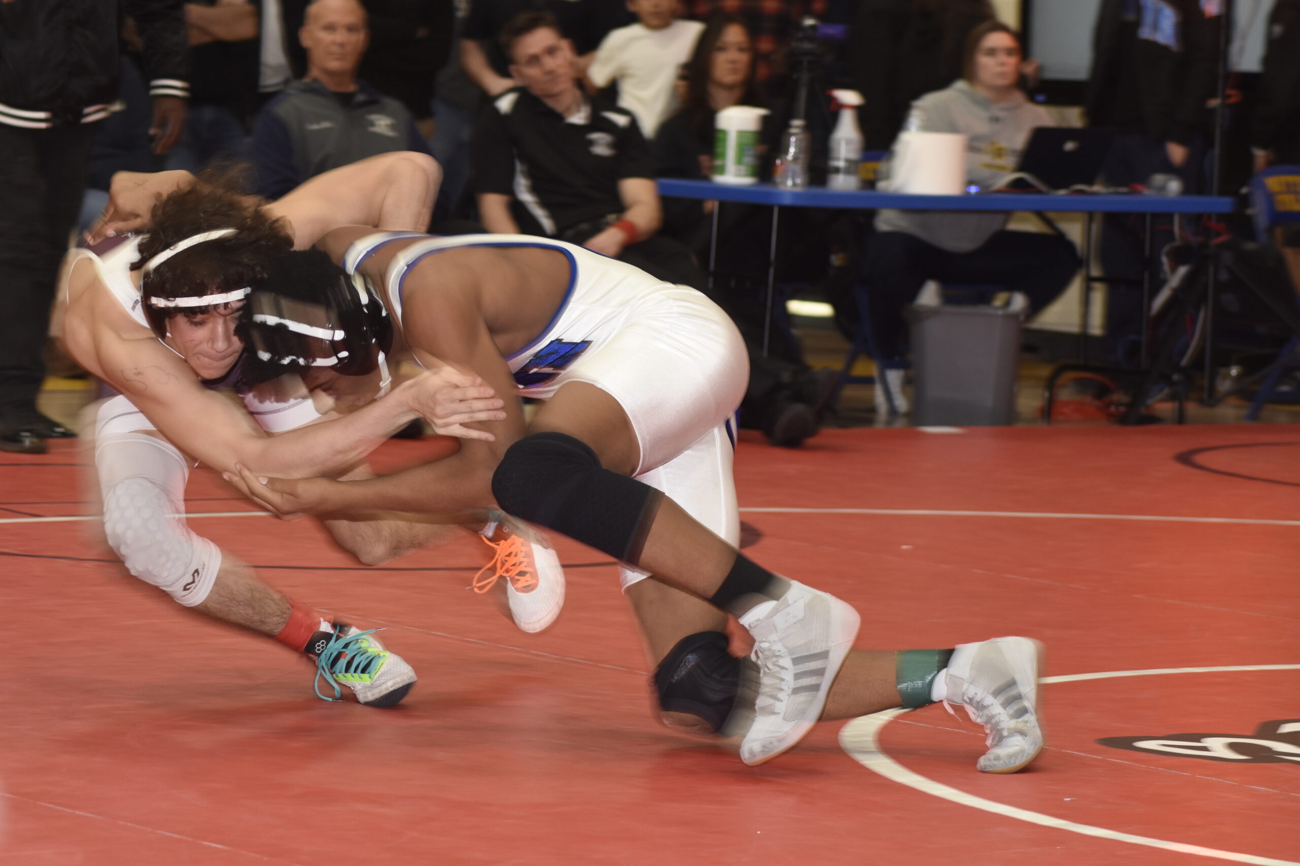 Southampton Gabe Lopes tries to fend of Glenn's Jasai McKay in the consolation finals.   DREW BUDD