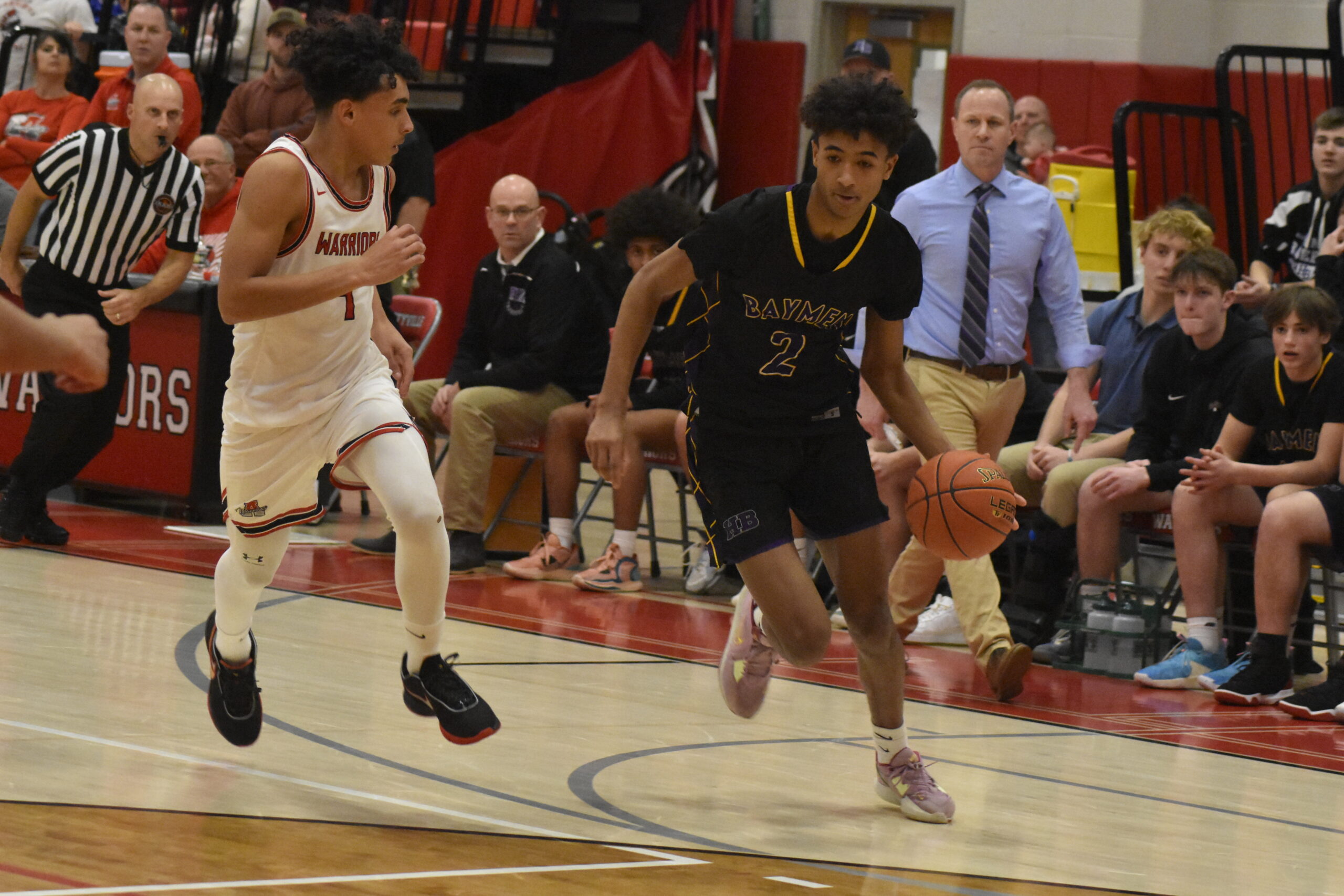 Hampton Bays senior Kazmin Pensa-Johnson looks to drives to the basket.   DREW BUDD