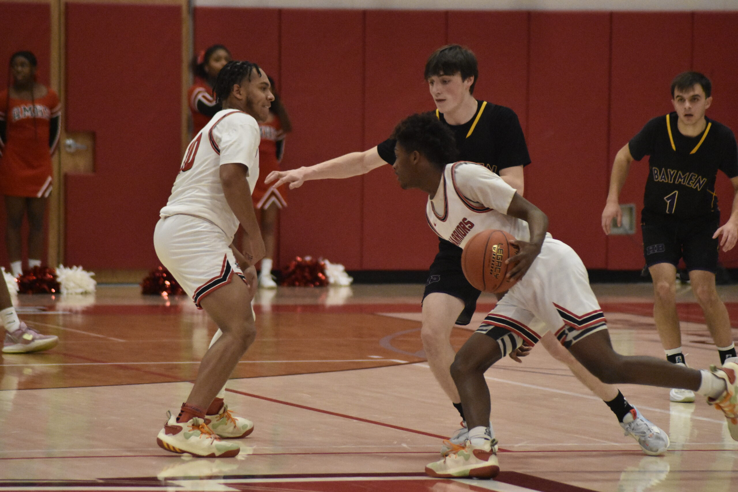 Hampton Bays junior Patrick Donahue feels the pick coming.   DREW BUDD