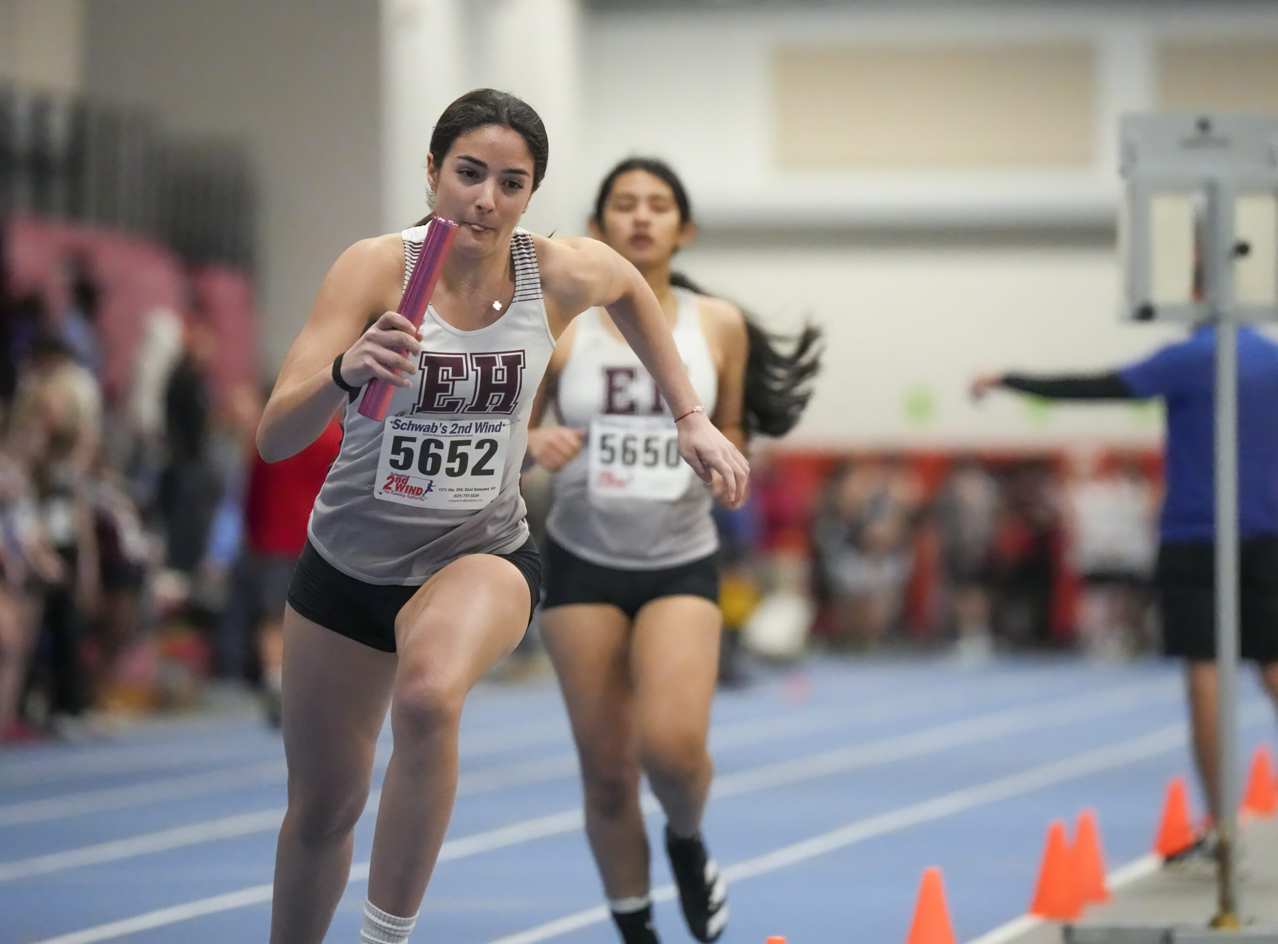 East Hampton senior Melina Sarlo takes off for her leg of the 4x400-meter relay.    RON ESPOSITO
