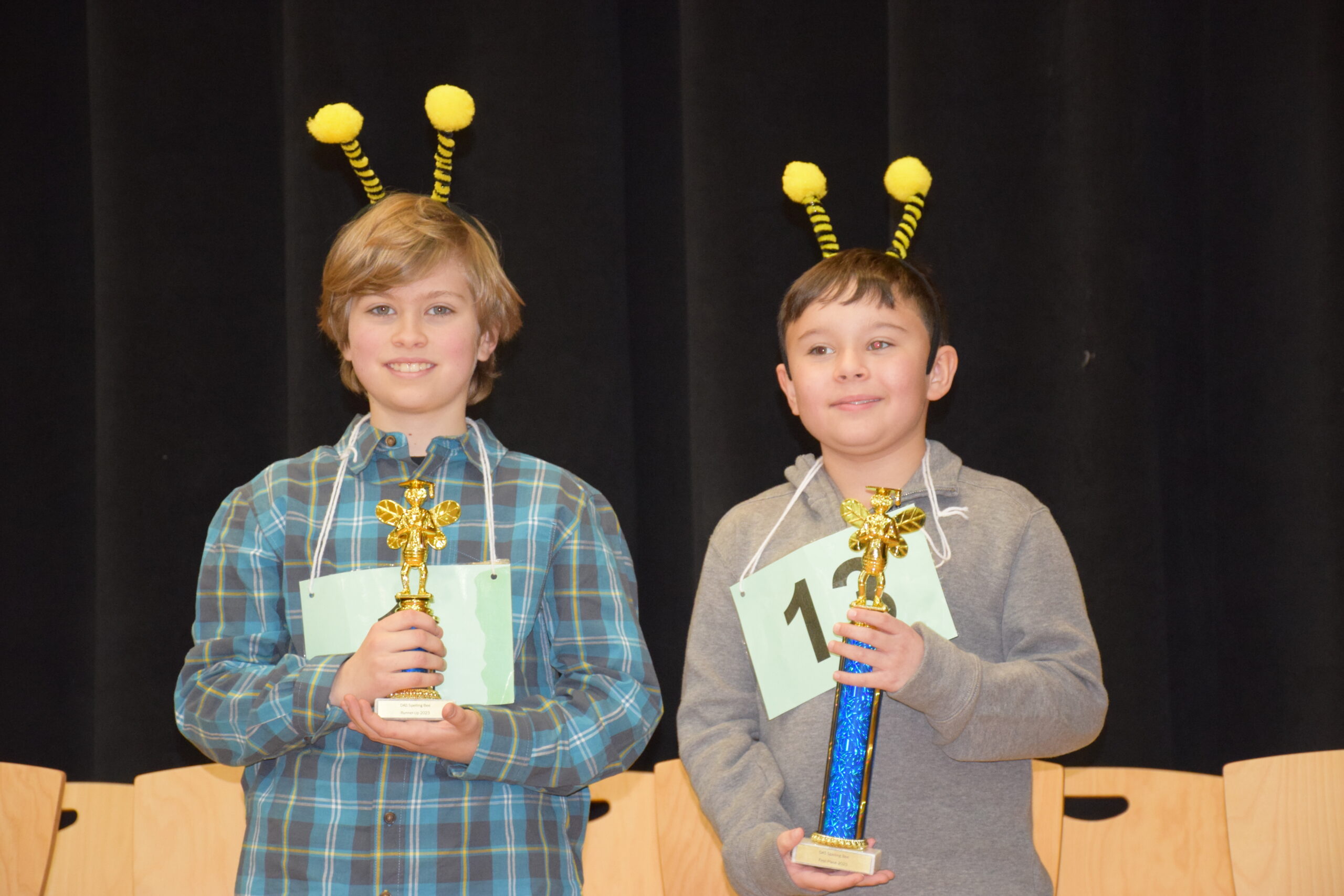 Dayton Avenue Elementary School third grade spelling bee runner-up Nathan Franco, left, and winner Enzo Pastor with their trophies. Enzo moves on to the regional competition. COURTESY EASTPORT-SOUTH MANOR SCHOOL DISTRICT