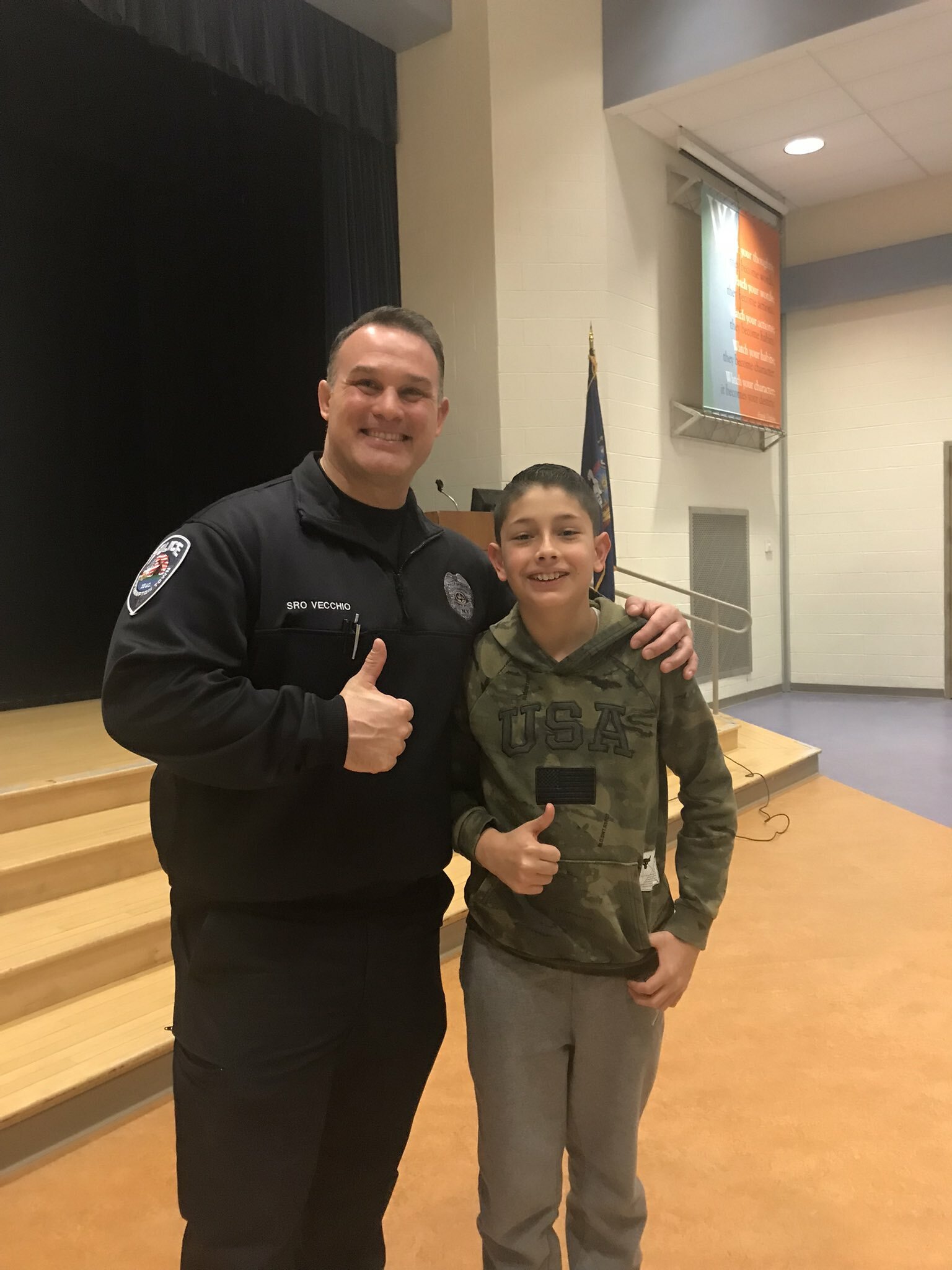 Hampton Bays Middle School students, including Santiago Cortez Molina, recently participated in an antibullying assembly with School Resource Officer Tony Vecchio of the Southampton Town Police Department. Officer Vecchio spoke to students about in-person and online bullying, internet safety and the importance of treating each other with kindness. COURTESY HAMPTON BAYS SCHOOL DISTRICT
