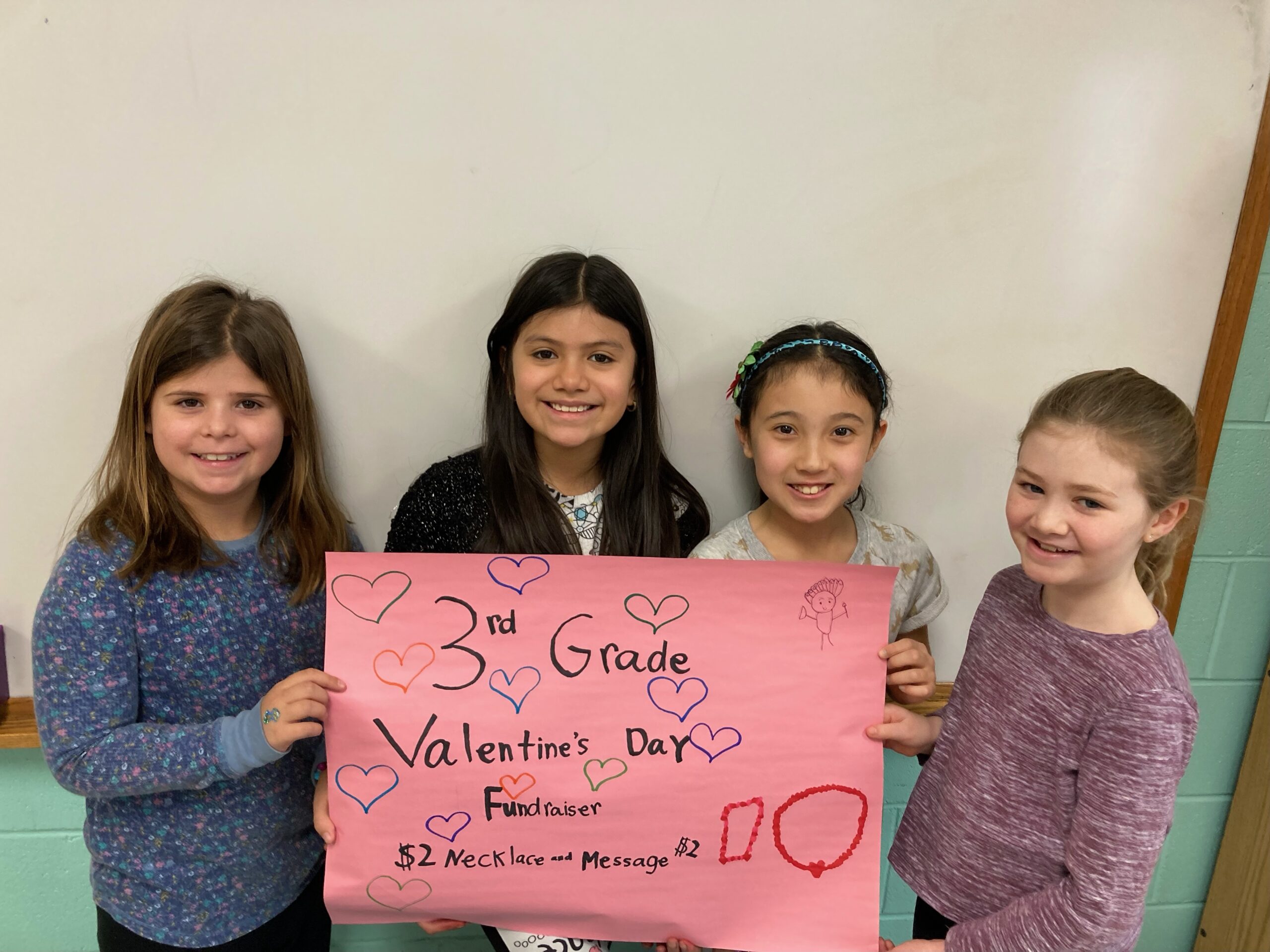 Hampton Bays Elementary School third grade students recently raised money toward their upcoming field trip to the Vanderbilt Planetarium and Museum by selling valentines. They helped promote the fundraiser by making signs, and parent volunteers assisted by selling them during student lunch periods. On the
morning of Valentine's Day, the students delivered the purchased valentines to classrooms around the building. The total raised was $966. From left, Tessa Obert, Debbie
Cabrera, Vivian Rozzi and Emma Kirst, who worked on the project.