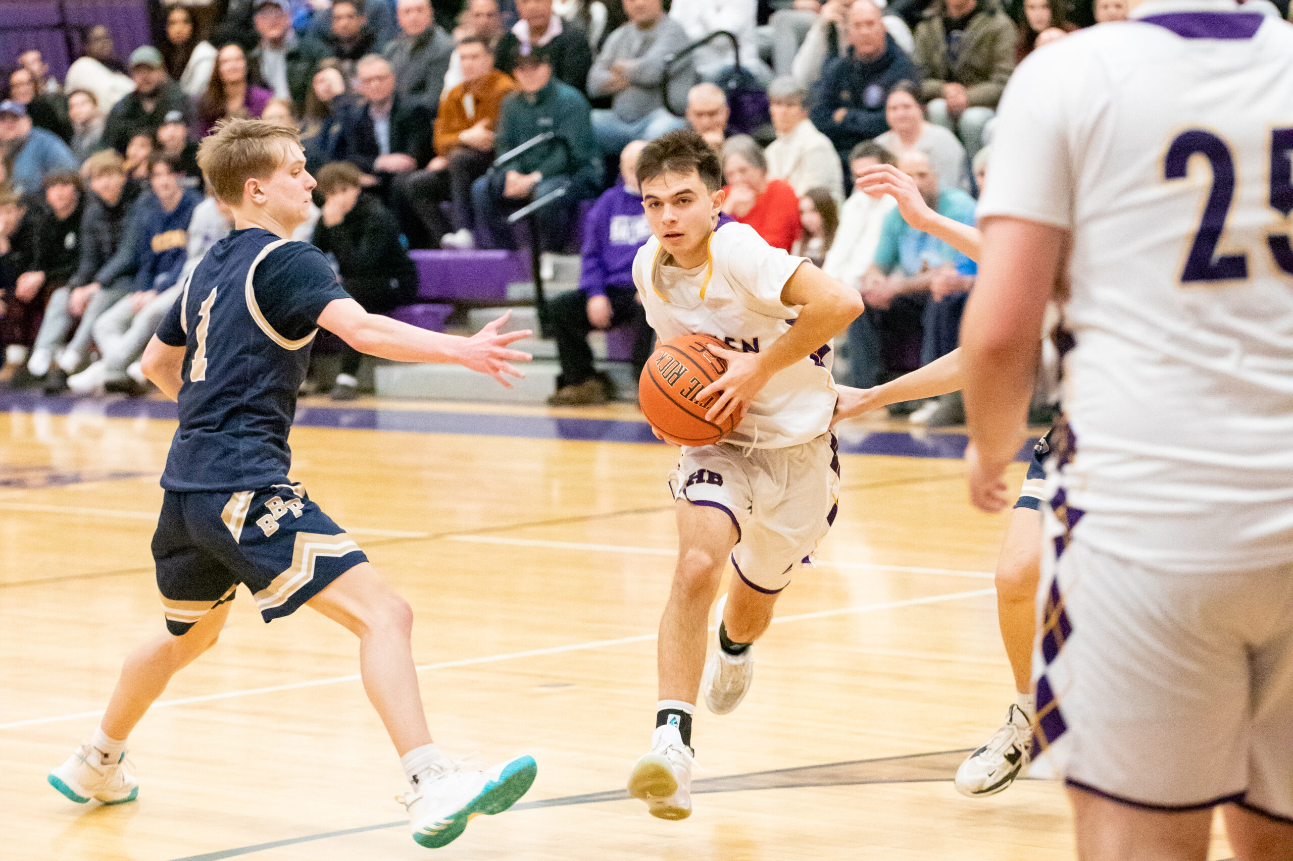 Senior guard Gianni Scotto drives to the basket. MICHAEL O'CONNOR