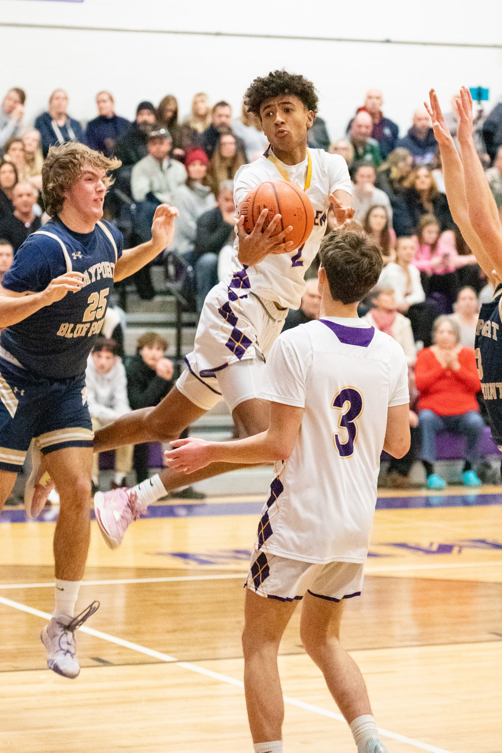 Senior guard Kazmin Pensa-Johnson lifts the ball out of traffic. MICHAEL O'CONNOR