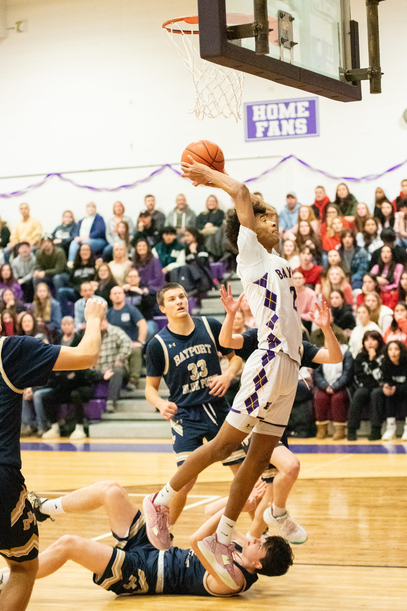 Senior guard Kazmin Pensa-Johnson reaches for the rim. MICHAEL O'CONNOR