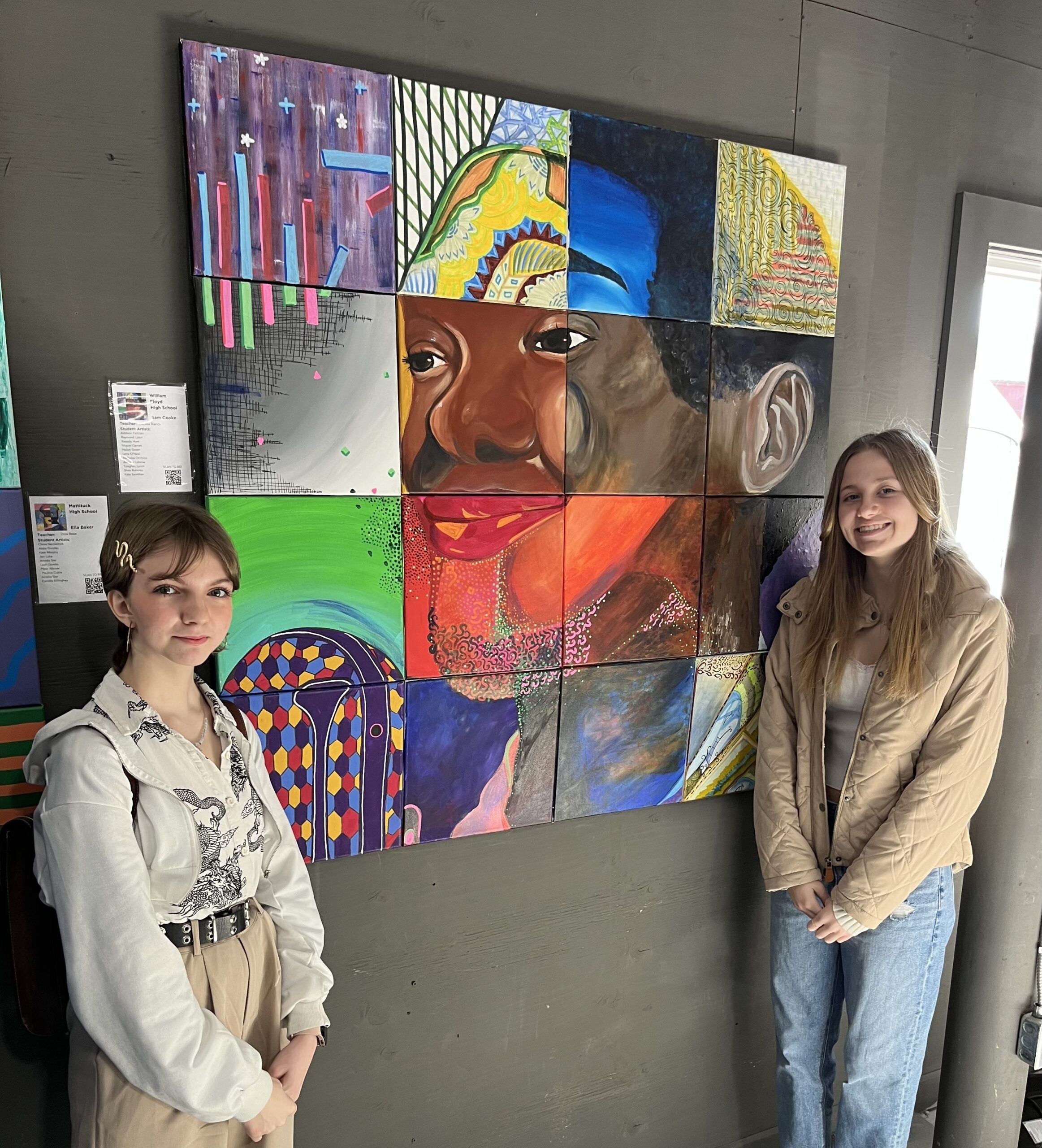 Hailey Green and Kate Samlihan of William Floyd High School with their collaborative mosaic mural of Sam Cook. ELIZABETH VESPE