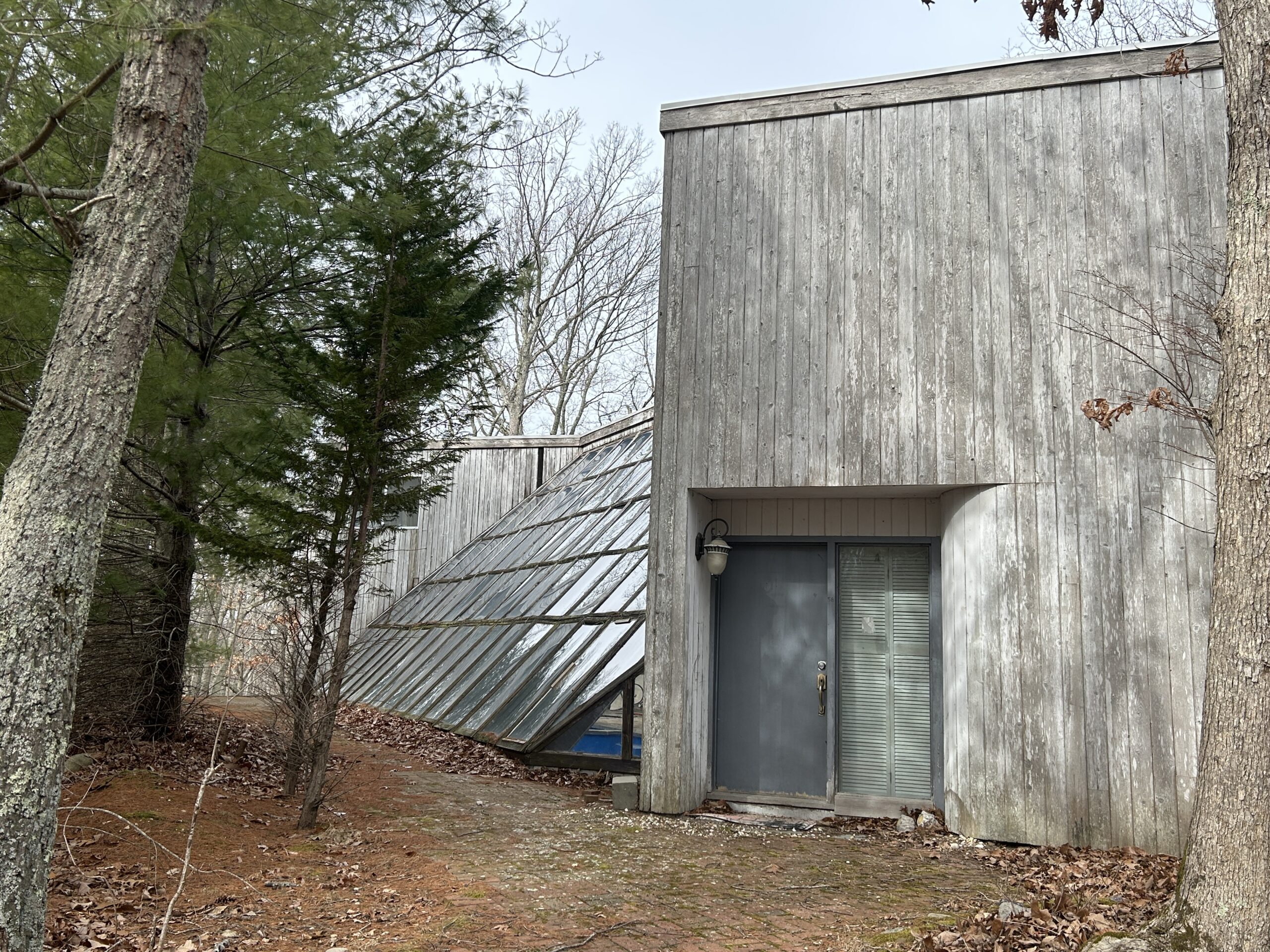 Vandals broke the angled windows to access an indoor pool in a Sag Harbor 