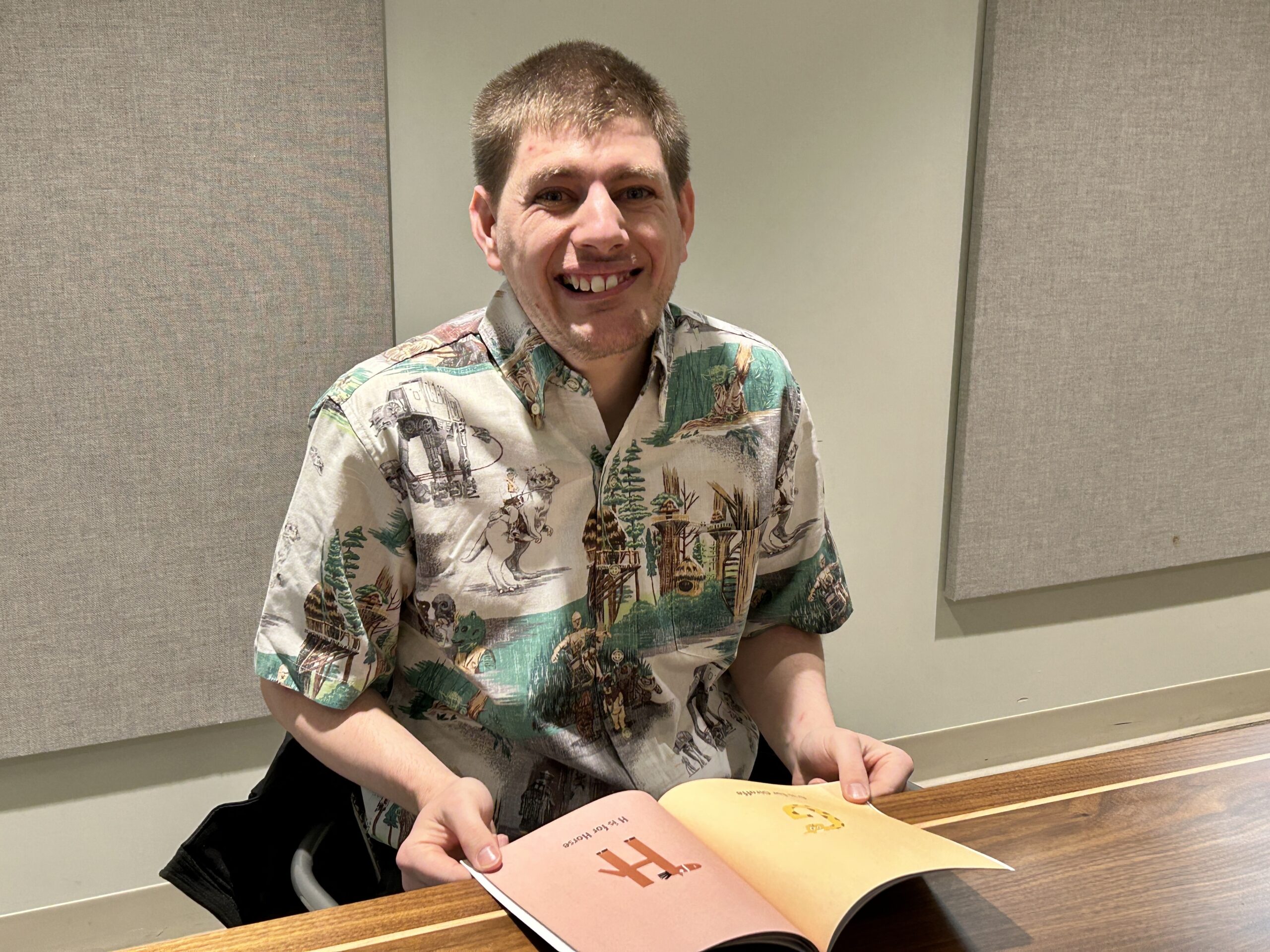 William Decker with his children's book, 