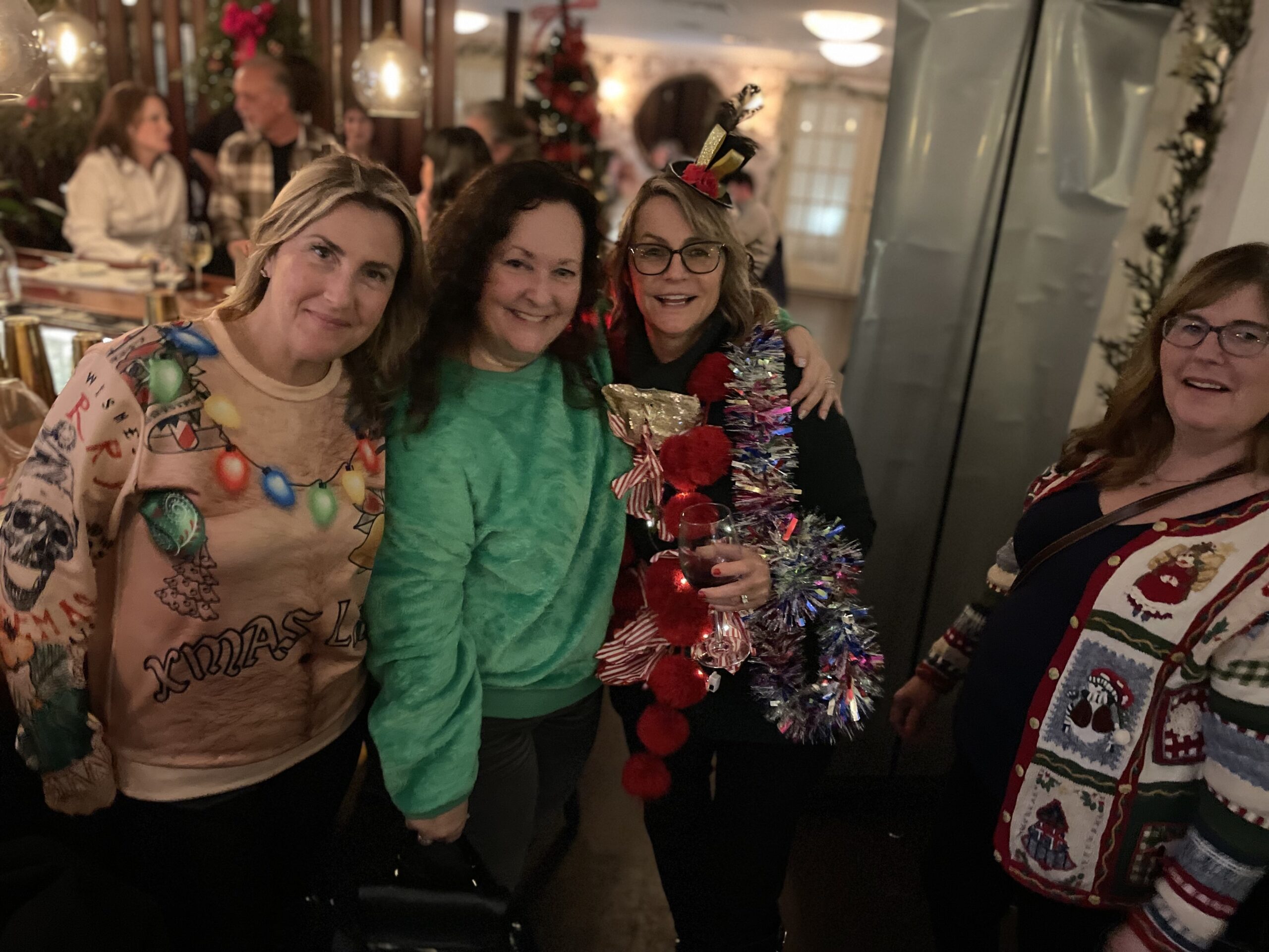 Scenes from the East End Women's Network's ugly sweater party last year. COURTESY KATHERINE PIERRO