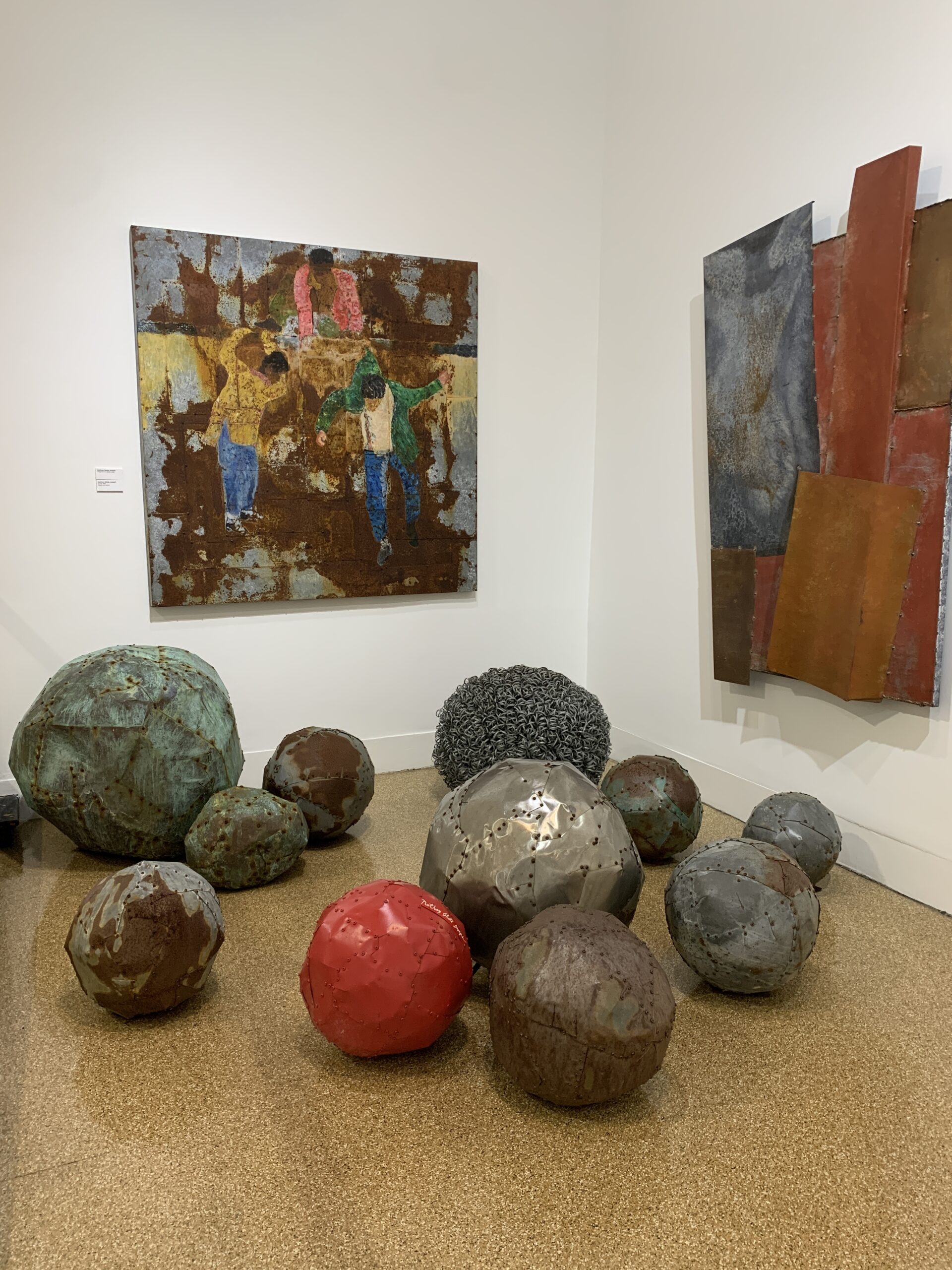 Sculptural piece and paintings by Nathan Slate Joseph on view in 