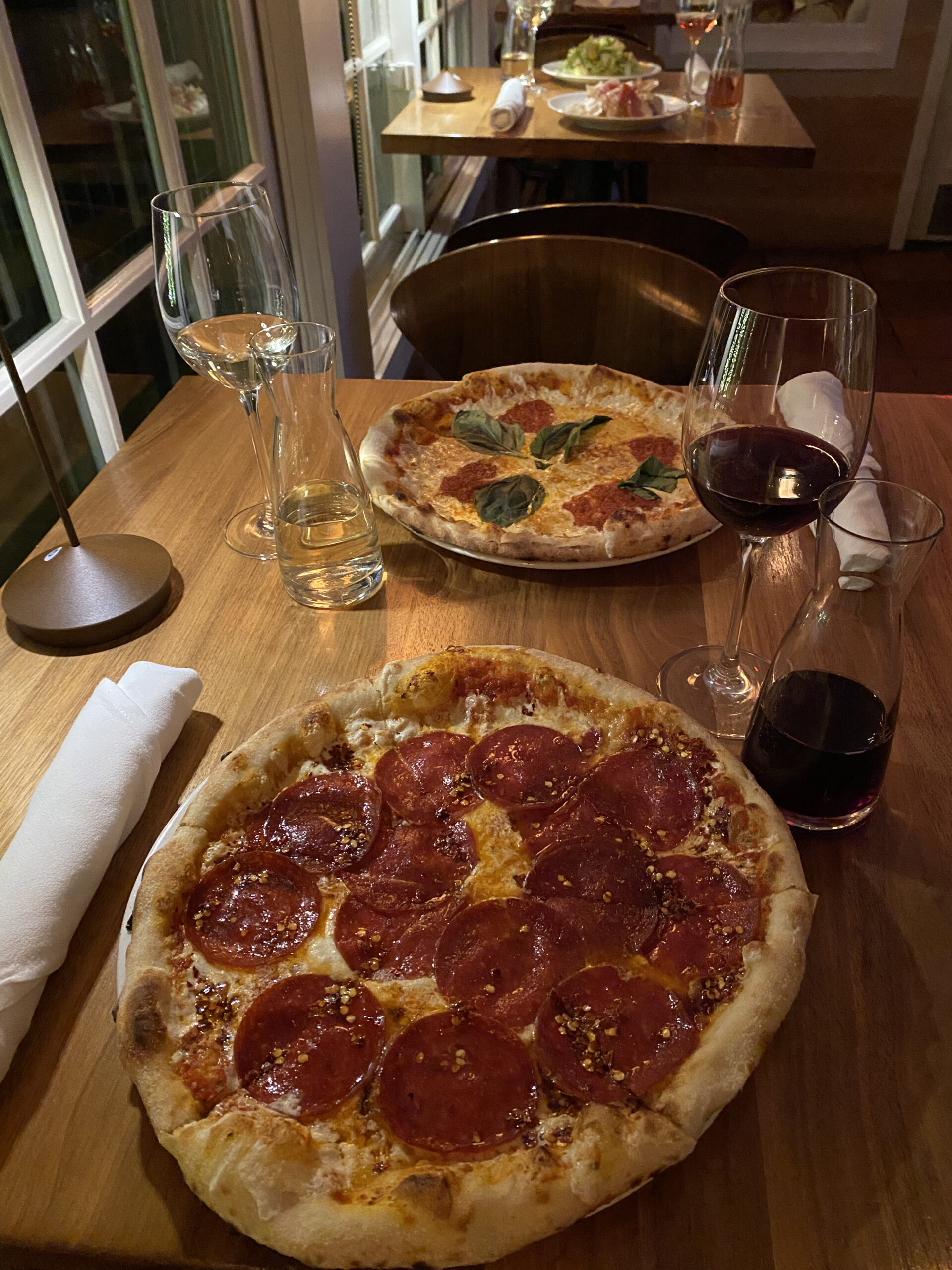 Pizza and wine special is offered at the bar at Nick & Toni's. COURTESY NICK & TONI'S