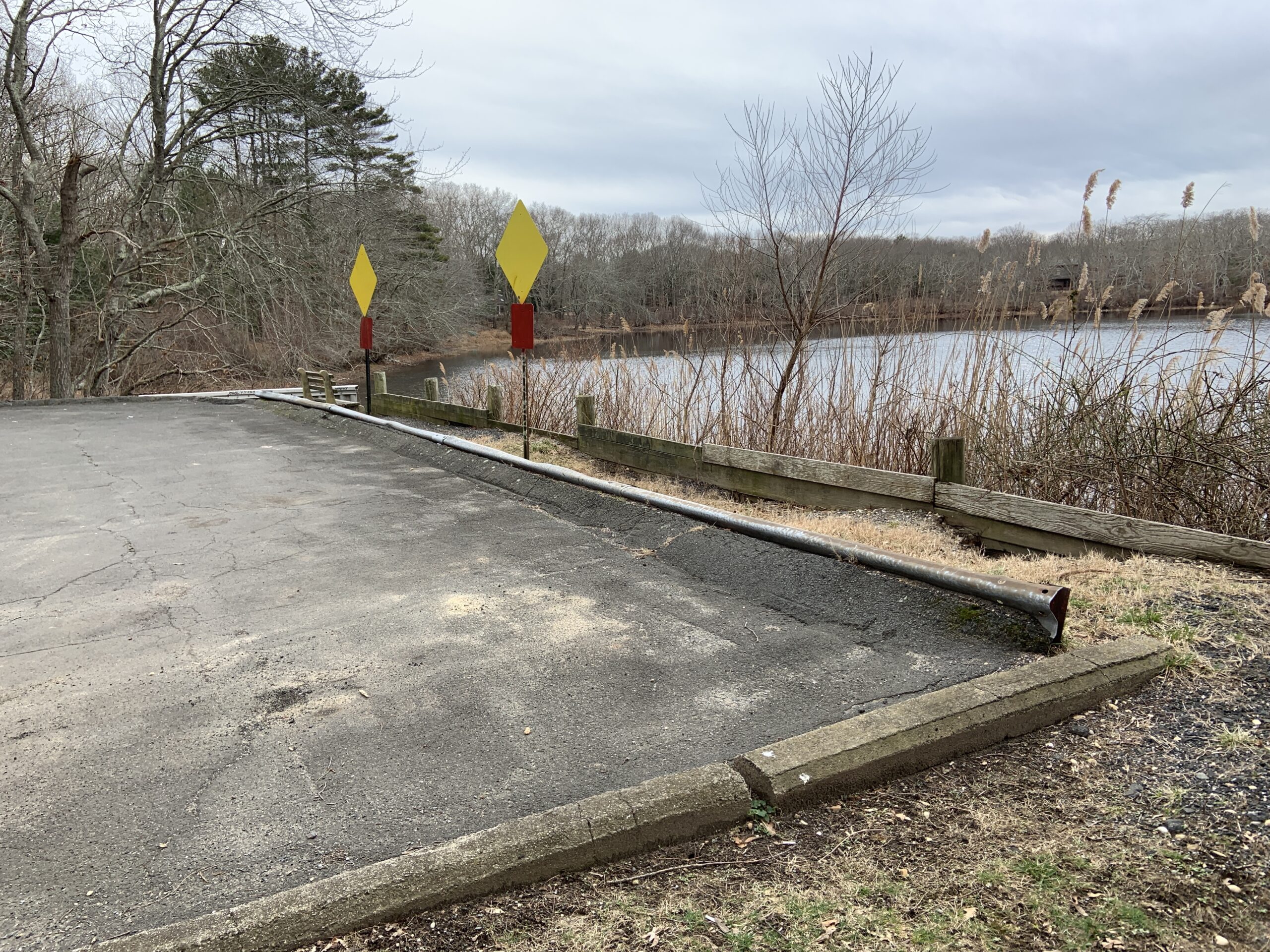 The end of Middle Line Highway at Round Pond will be transformed into a natural shoreline through a project being coordinated by Southampton Town and the Village of Sag Harbor.  STEPHEN J. KOTZ
