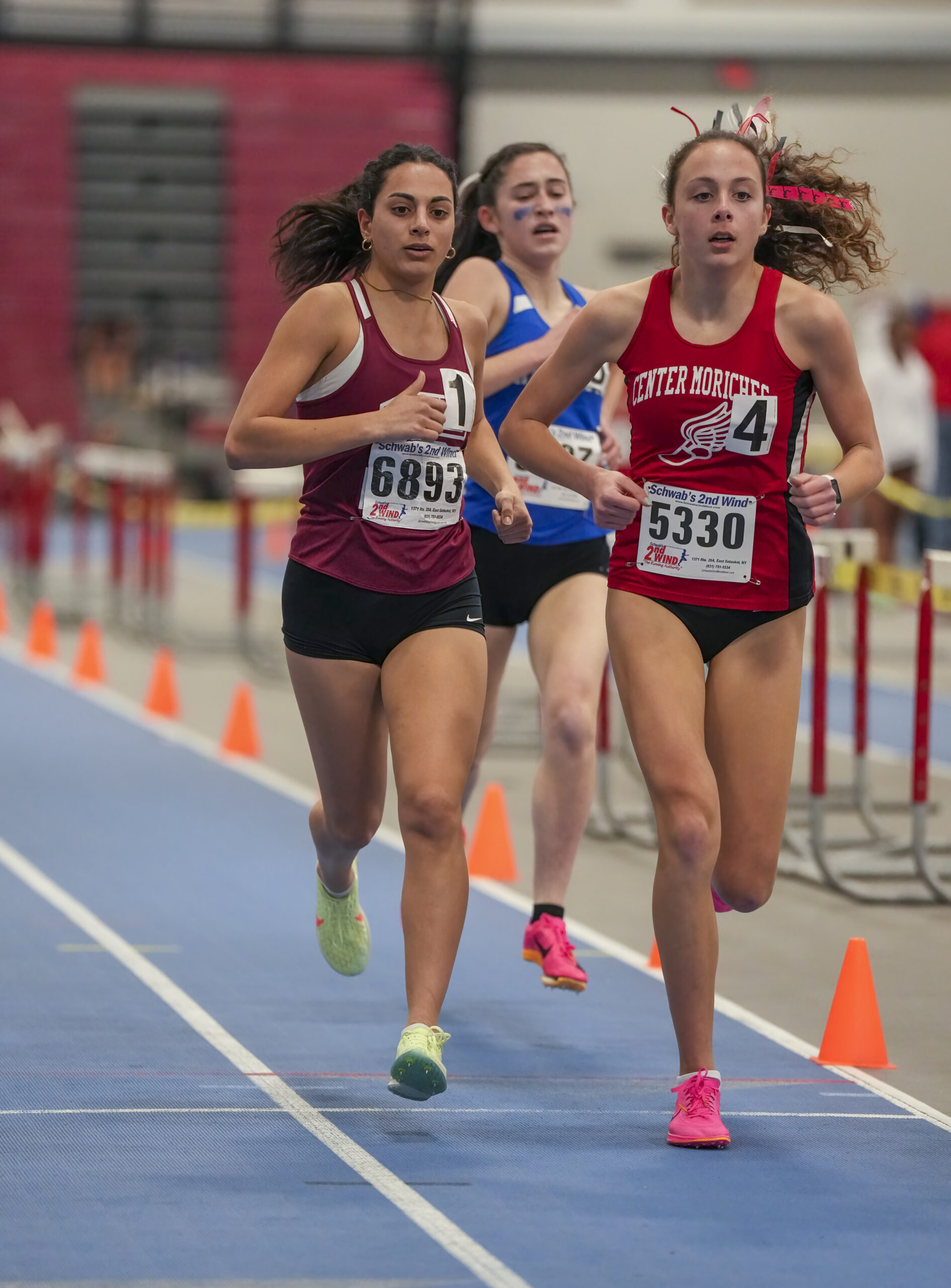 Southampton's Jeorgiana Gavalas running in the 1,500-meter race.   RON ESPOSITO