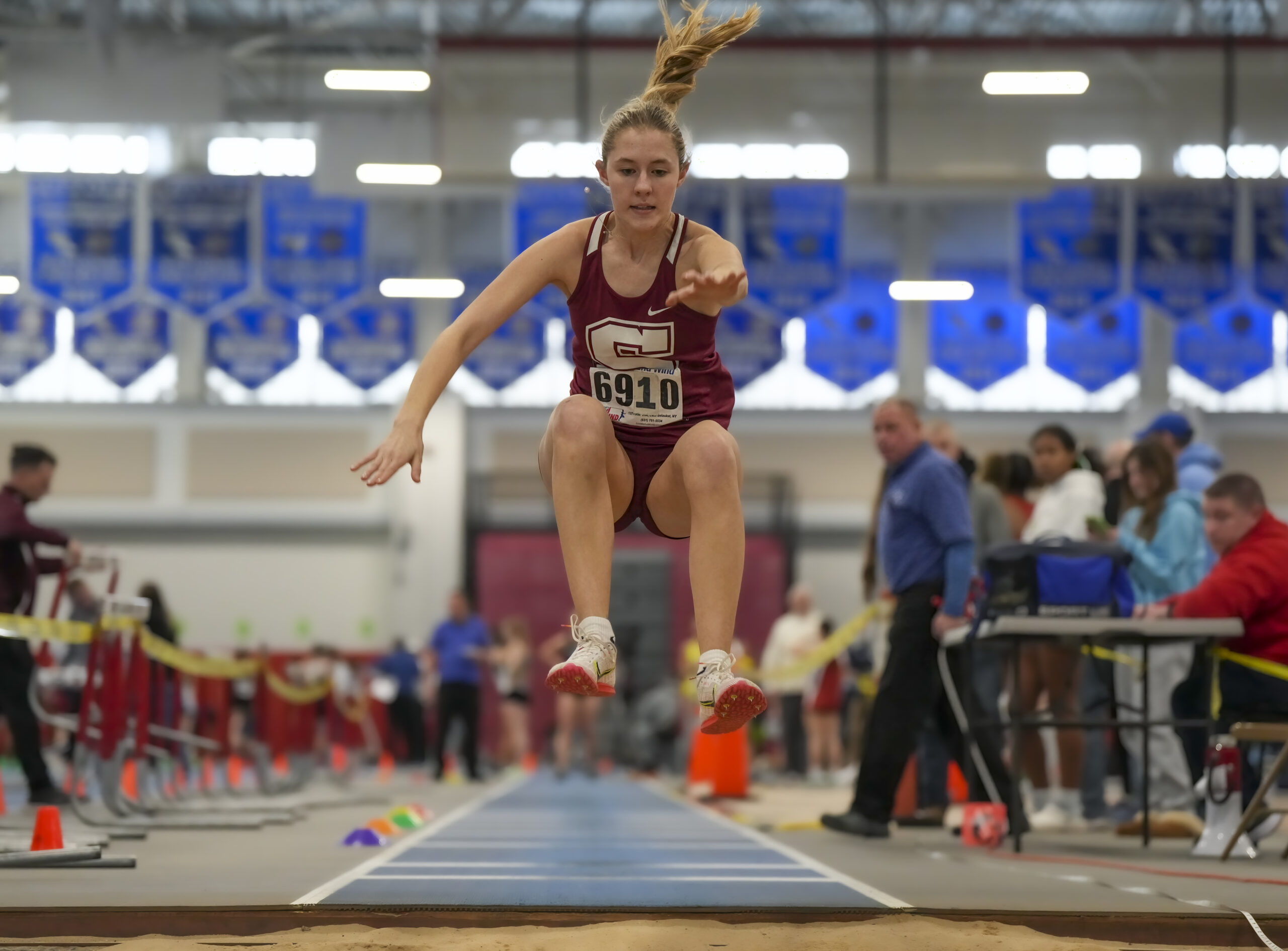 Southampton's Emily Zukosky leaps in the triple jump.  RON ESPOSITO