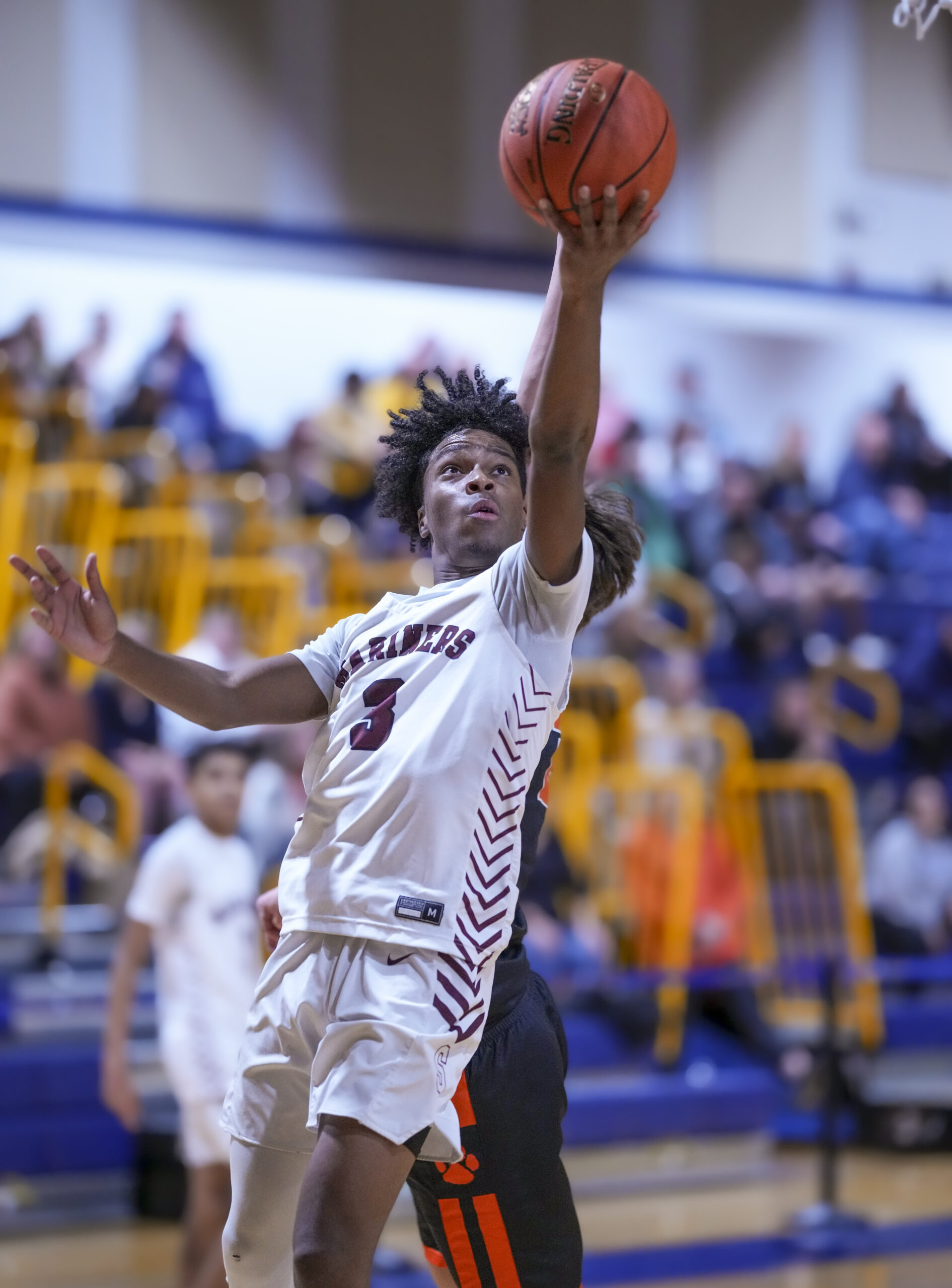 Southampton senior Derek Reed goes up lefthanded for two points.   RON ESPOSITO