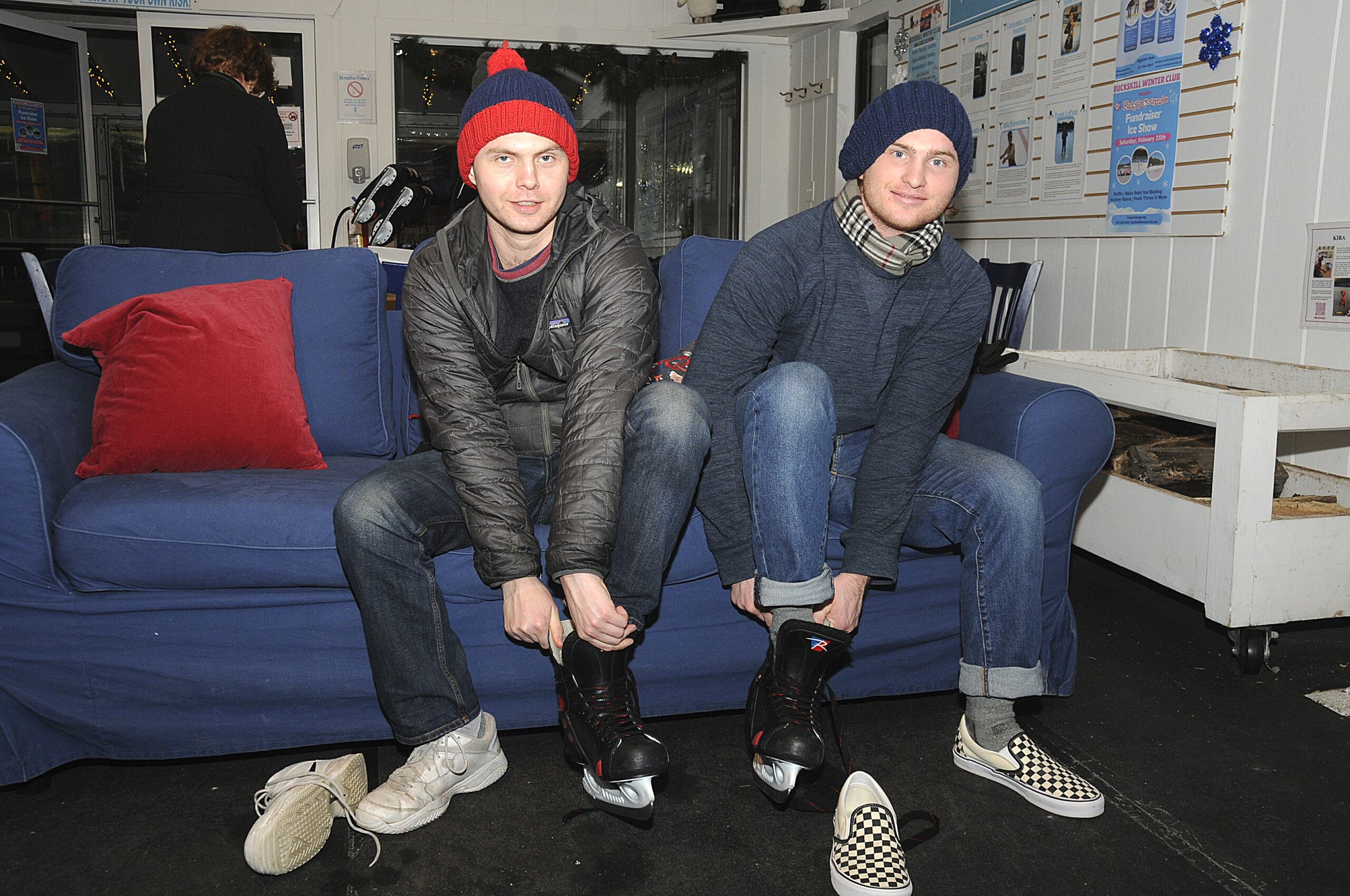 Roland and Robert Montgomery  lace up their skates at Bay Street Theater's  3rd Annual Broadway Skating Party on Sunday at Buckskill Winter Club in East Hampton.    RICHARD LEWIN