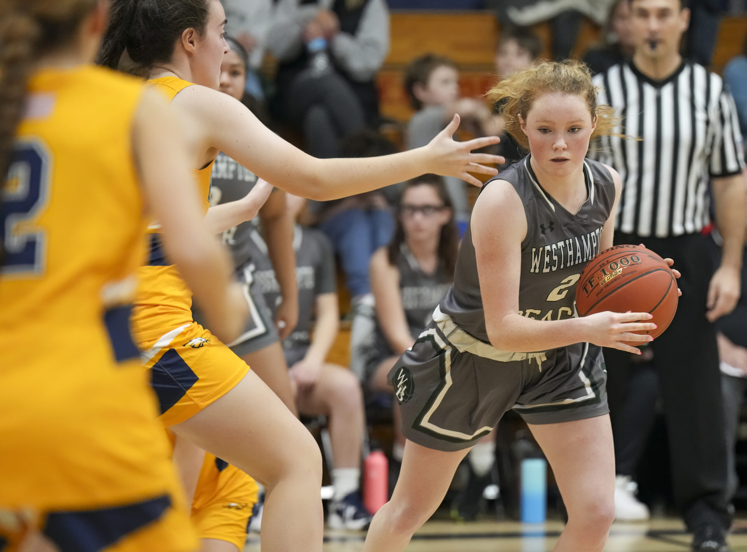 Westhampton Beach junior Sarah Gormley tries to work around the West Babylon defense.   RON ESPOSITO