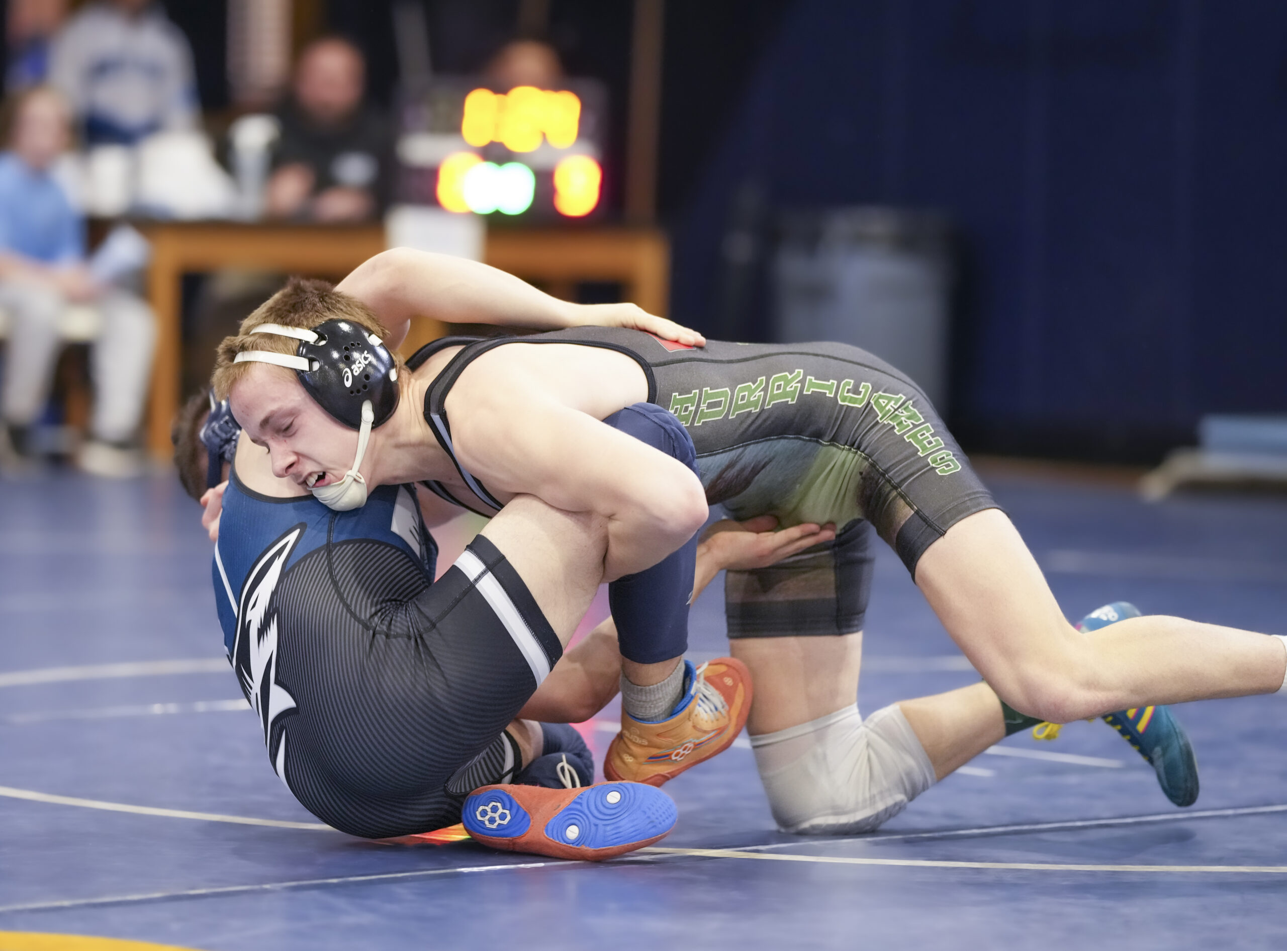 Westhampton Beach senior Dylan Specht works on taking down his opponent.  RON ESPOSITO