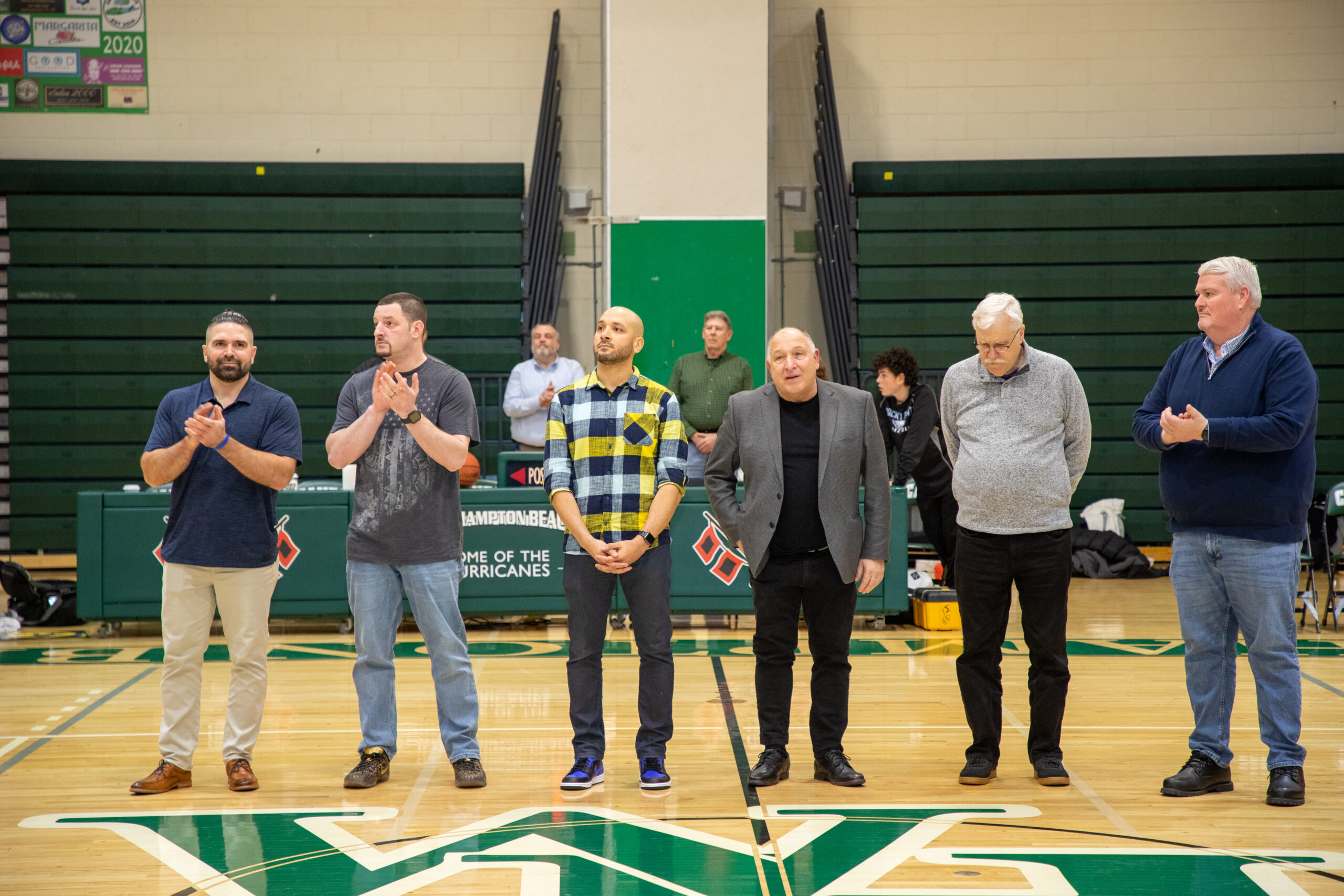 On hand Thursday night as part of a celebration of the 25th anniversary of the 1997-1998 team was, from left, players Dale Menendez, Adam Kandell, Bronson Martin and coaches Jack Vivonetto, Rich Wrase and Bill Hempfling.   MICHAEL O'CONNOR