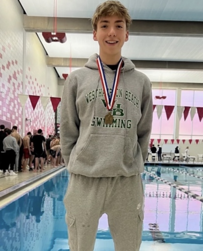 Westhampton Beach junior Max Buchen earned gold for his first-place finish in the 100-yard breaststroke at the Suffolk County Championships. WESTHAMPTON BEACH SCHOOL DISTRICT