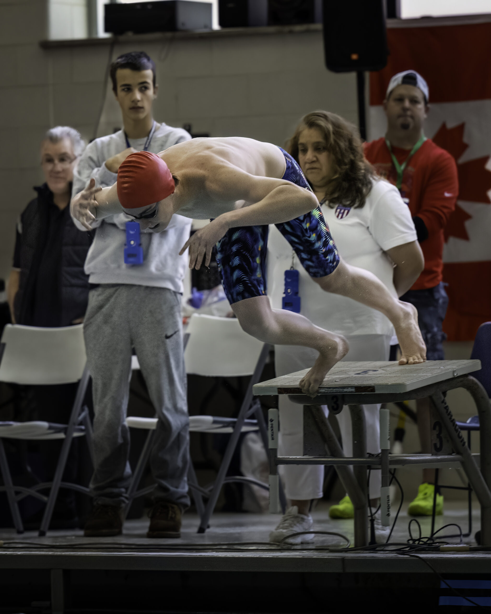 Westhampton Beach junior Max Buchen dives into the pool at Stony Brook University. MARIANNE BARNETT