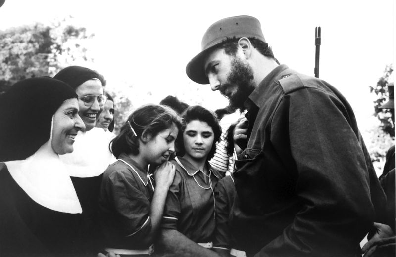 Fidel Castro with nuns in Cuba. Burt Glinn photo