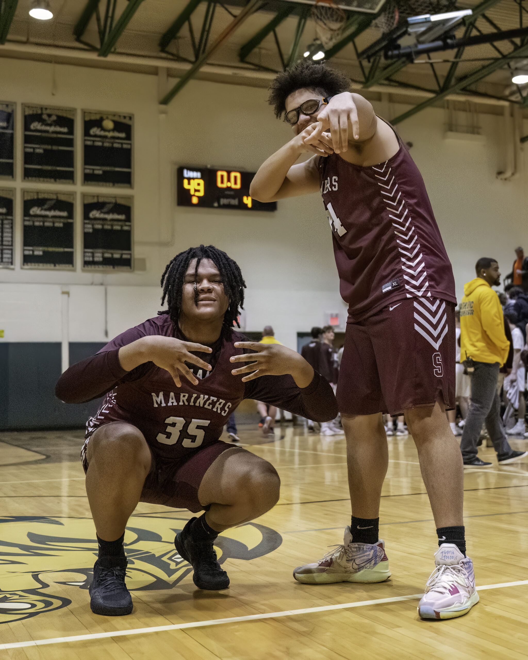 Mariners Ayden Eleazer, left, and Noomie Williams pose for a shot after their team's victory.   MARIANNE BARNETT