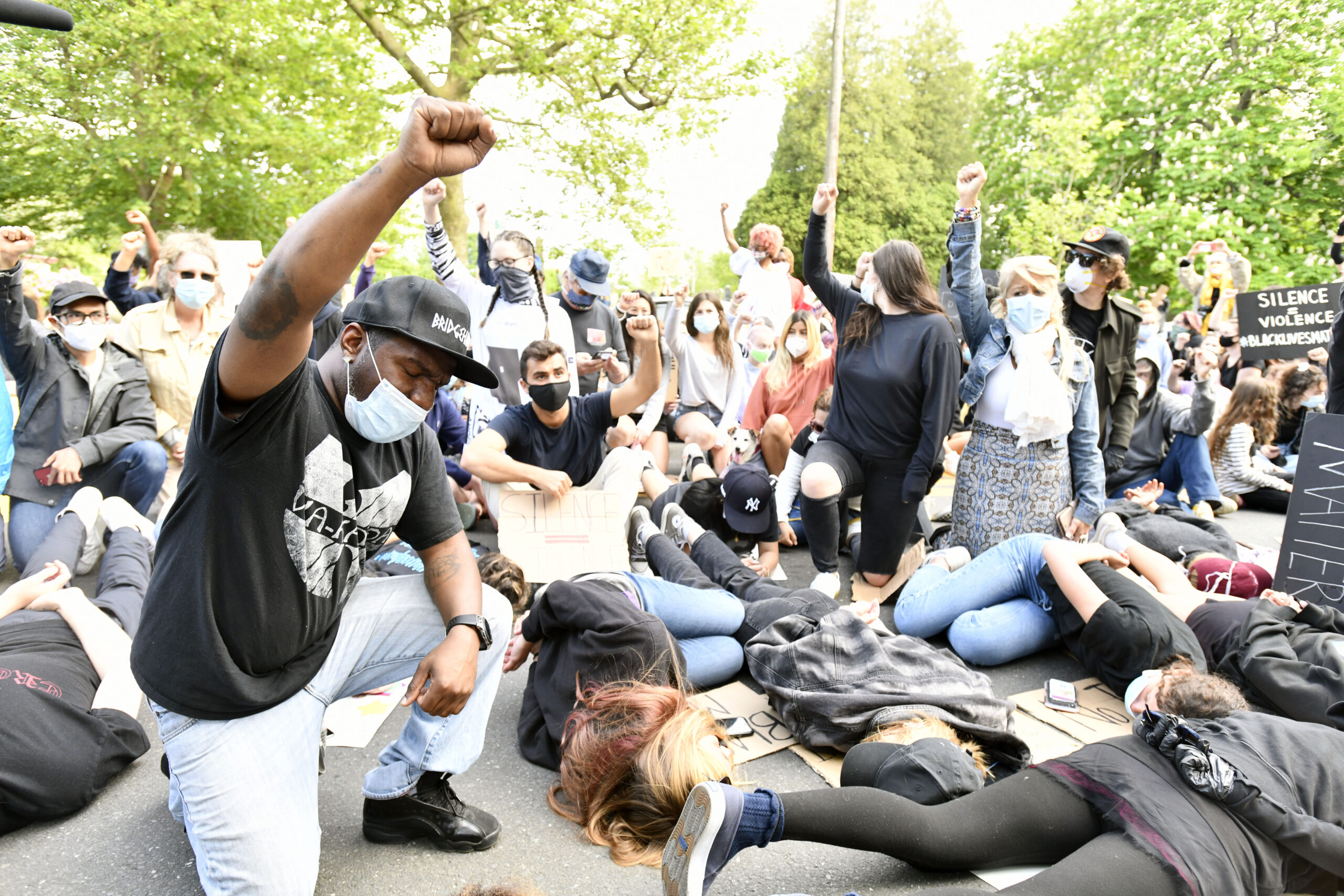 Masks became a common sight in everyday life. Hundreds of people attended the Black Lives Matter protest in Bridgehampton in June of 2020, masked.  DANA SHAW