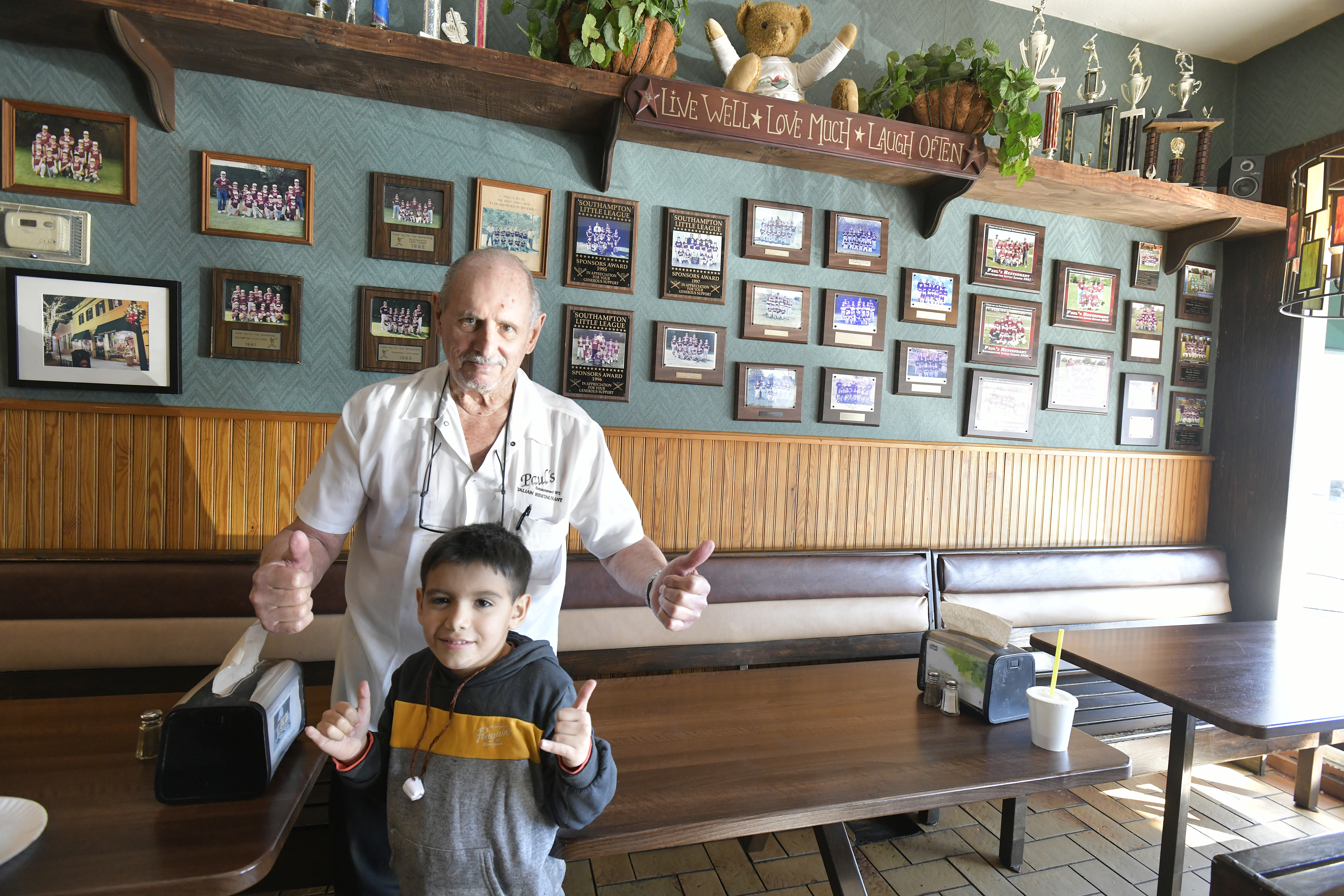 Paul DeRobertis with his grandson, Andre, at Paul’s Italian Restaurant in Southampton.  DANA SHAW