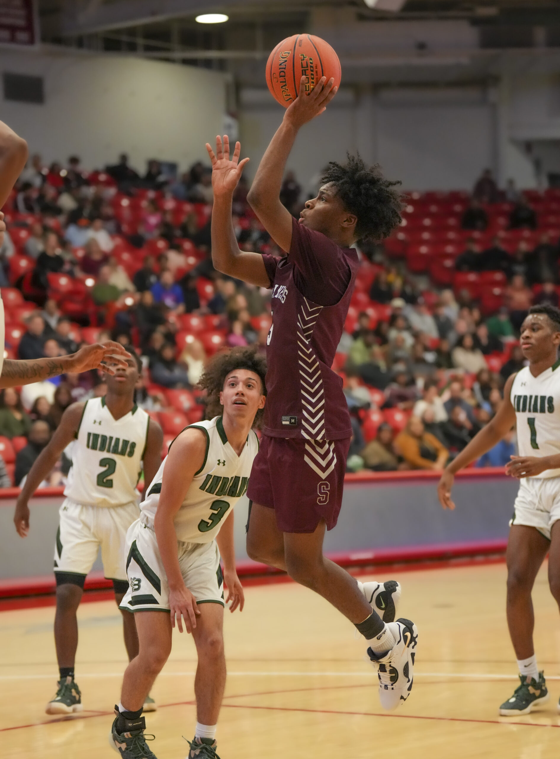 Southampton senior Derek Reed tries to get a shot off.   RON ESPOSITO