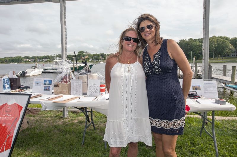 Event organizer Patti Frank with April Jakubauskas at a fundraiser to raise money to fight Multiple Myeloma. Michael Heller photo