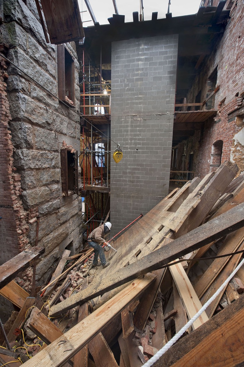 At one point in the fall of 2012, three floors collapsed, revealing the three-story high granite vault. 