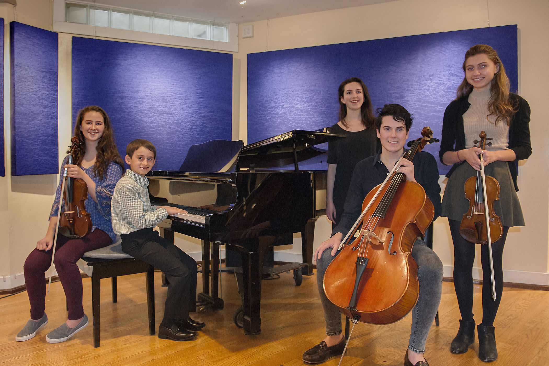 Classical students Caleigh Kiembock, Justin Gardener, Ariana Moustakas, Kivlan King and Julia Kepcznska, who will be performing in the 8th Annual Classical Students for Katy's Courage concert at the Bay Street Theater on March 20, are photographed in thwe theater's lobby on Thursday, March 10. Heller photo.