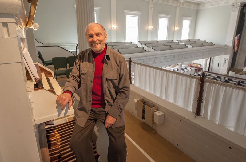 Walter Klauss with the organ at the Old Whalers' Church in Sag Harbor. Michael Heller photo. 