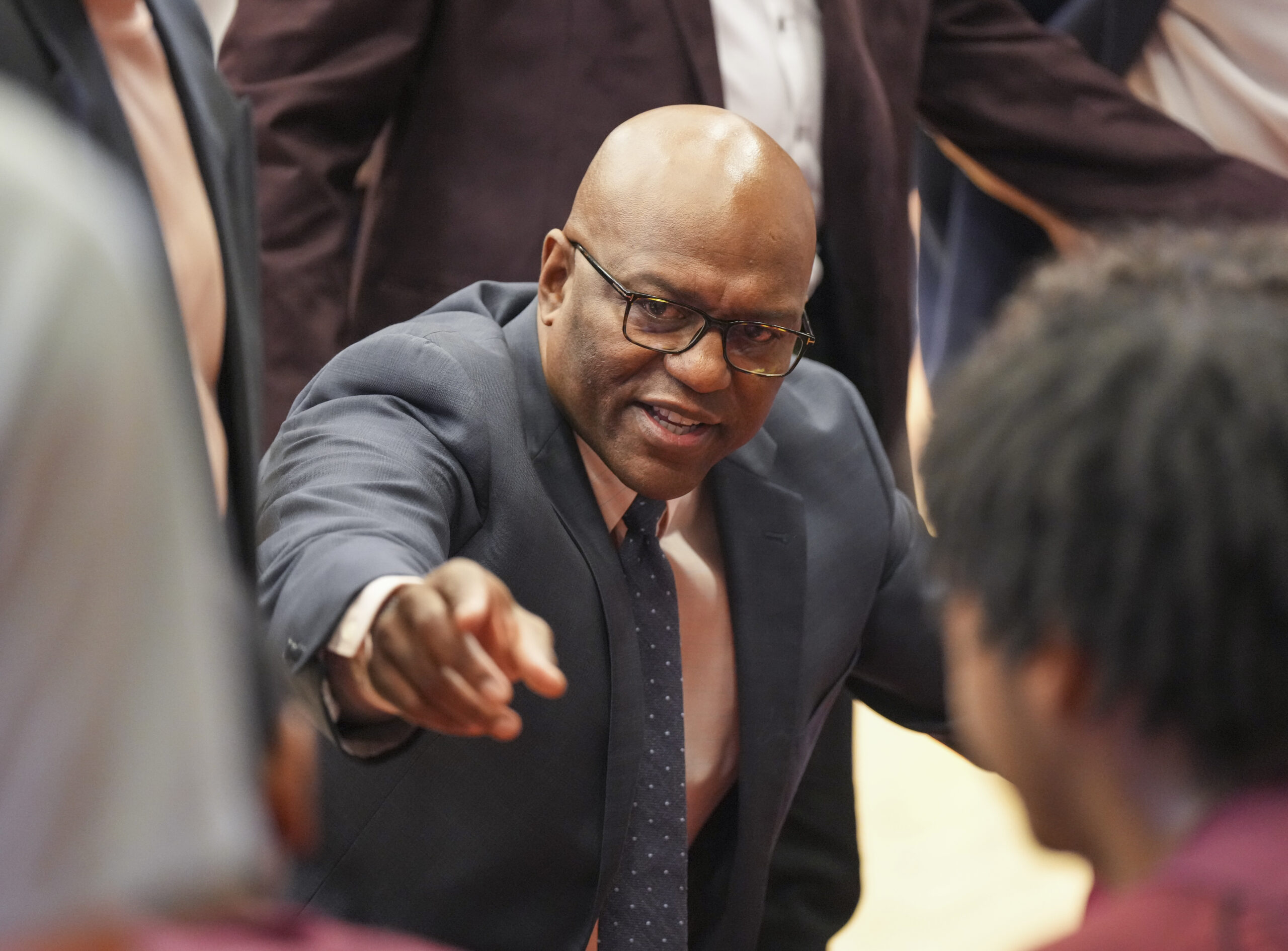 Southampton head coach Herm Lamison talks to his players during a timeout of Saturday's game.   RON ESPOSITO