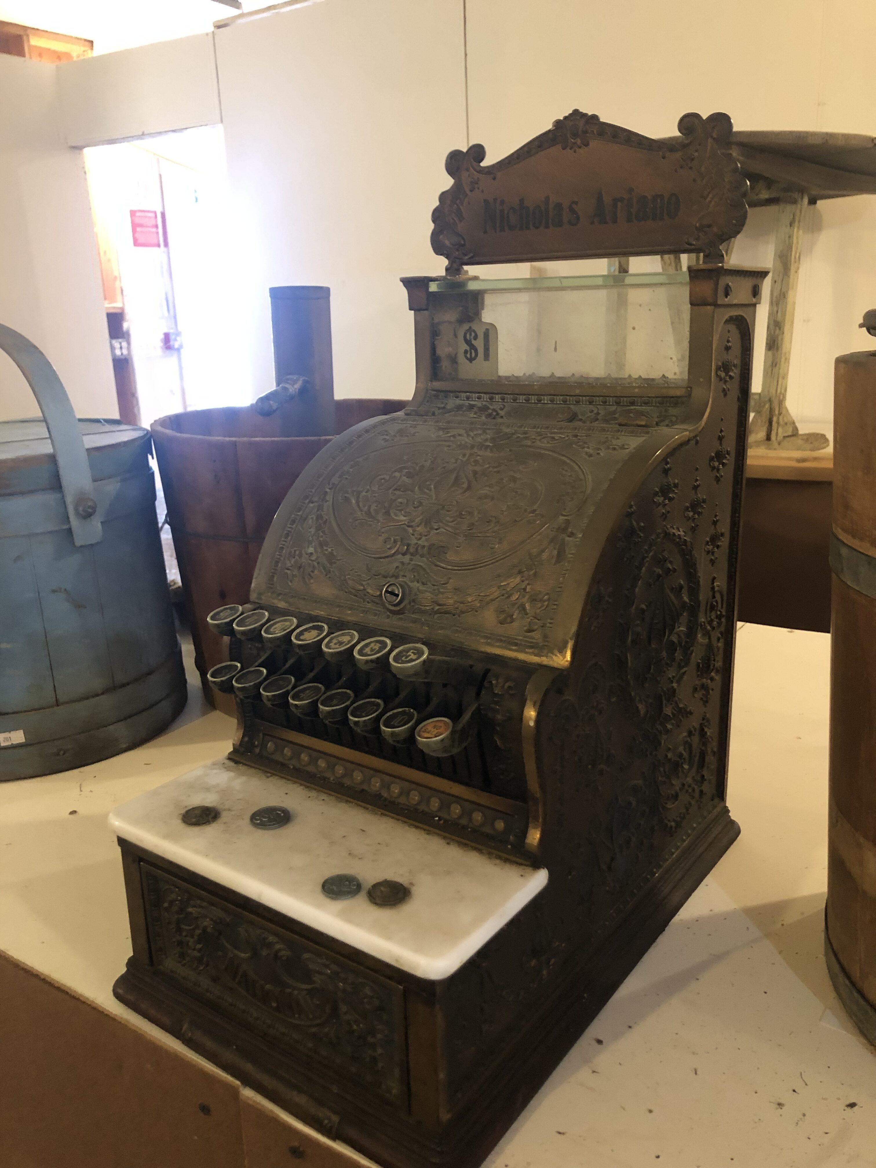 Mindy Gray, the new owner of the Sagg Store, has been working on renovations at the iconic location. Bringing in antique items like this old cash register will be part of the new look. CAILIN RILEY