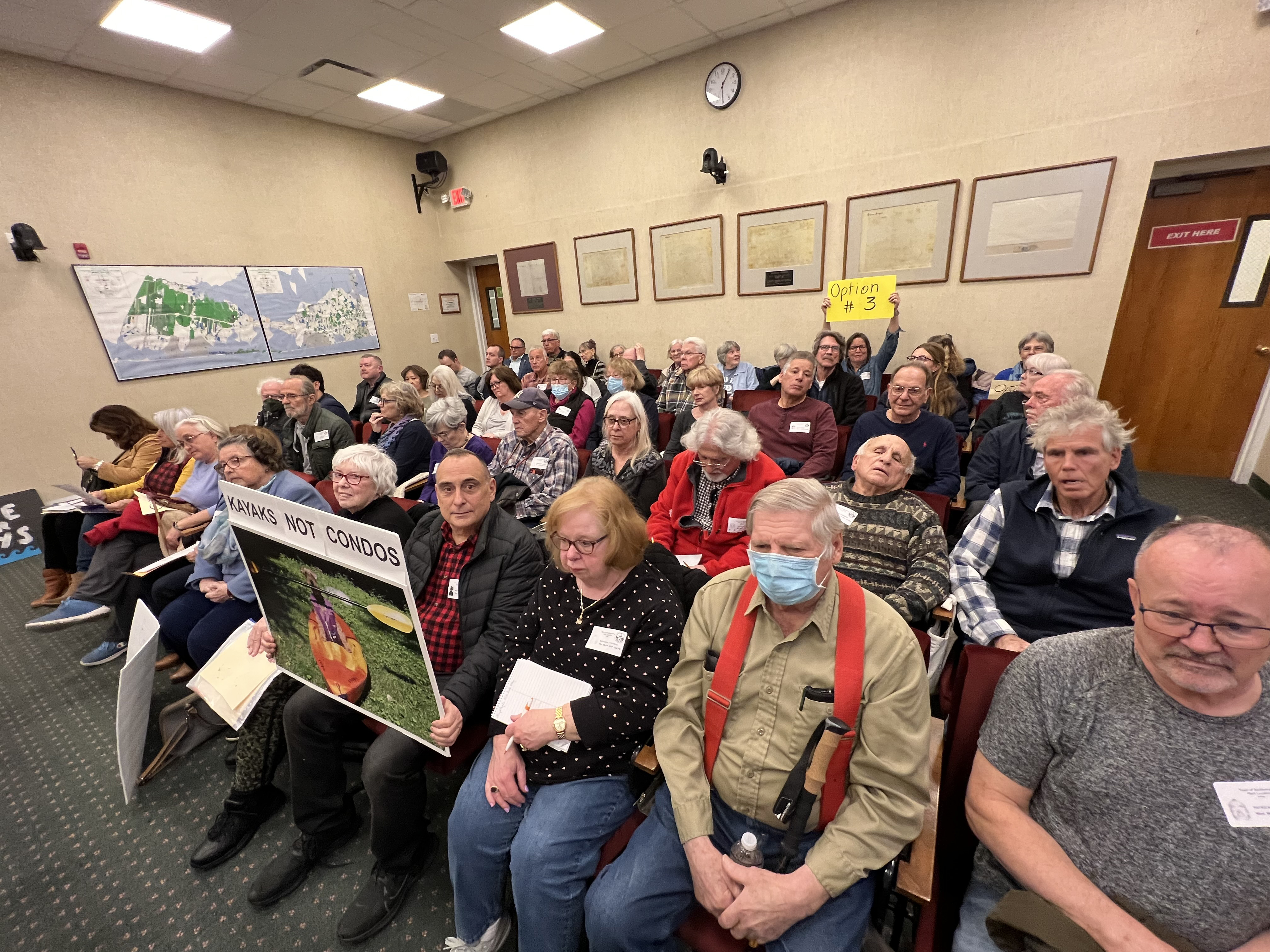 Bel-Aire Cove development opponents filled the town hall meeting room and spilled over to a second at Wednesday's meeting.  DANA SHAW