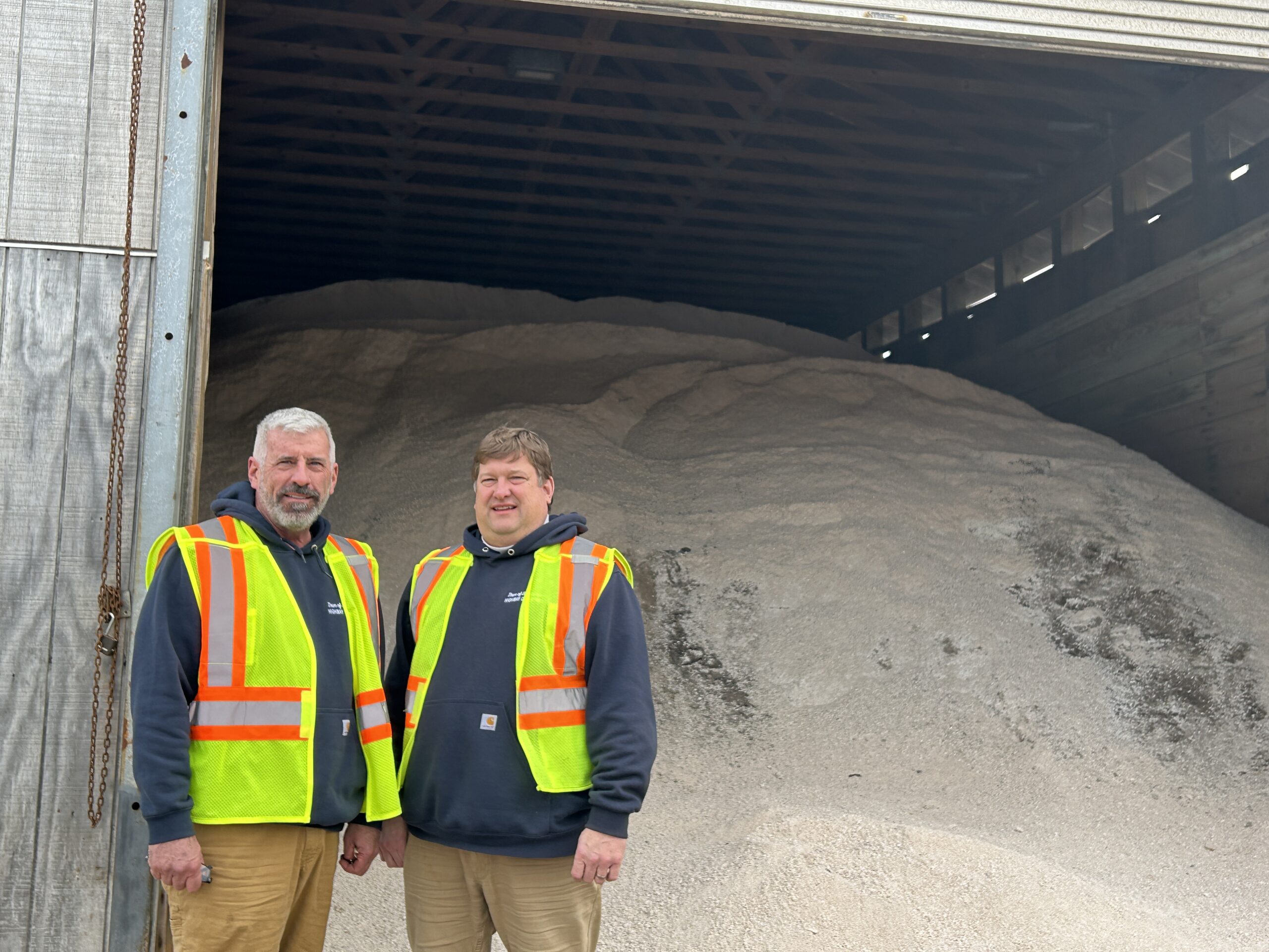 Southampton Town Highway Superintendent Charles McArdle and Deputy Superintendent Marc Braeger will the latest delivery of salt stockpiled n Hampton Bays.    KITTY MERRILL