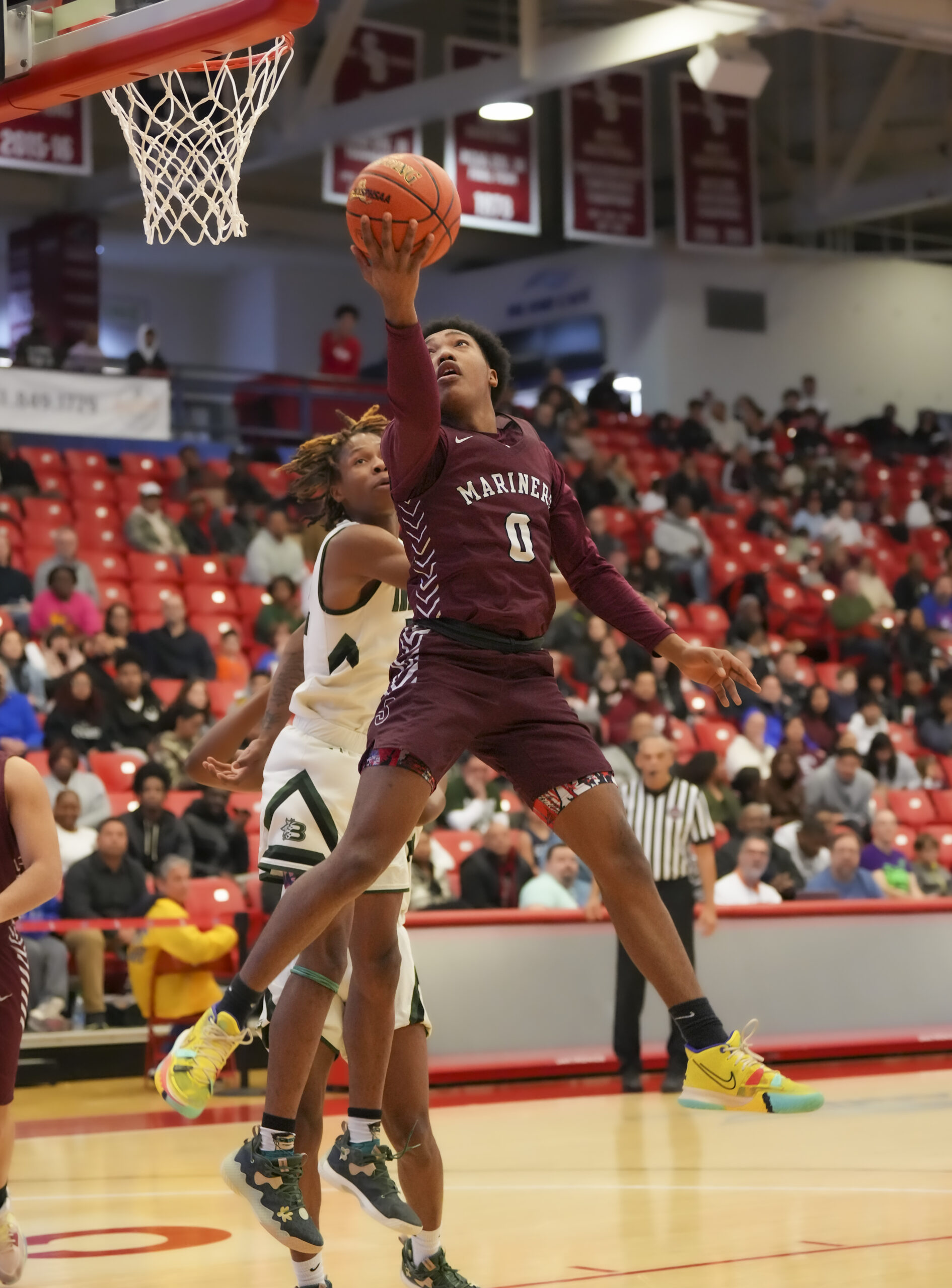 Southampton sophomore Naevon Williams goes with a reverse layup for a score.   RON ESPOSITO