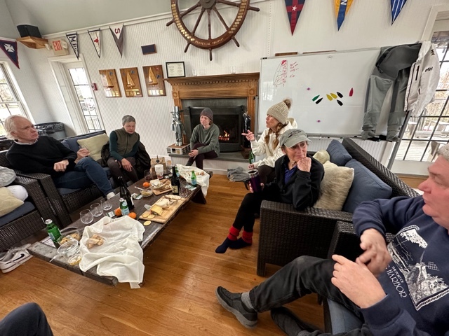 After sailing in some cold temperatures, the group likes to head back inside and enjoy some cheese, wine and a nice fire.    PAUL VOGEL