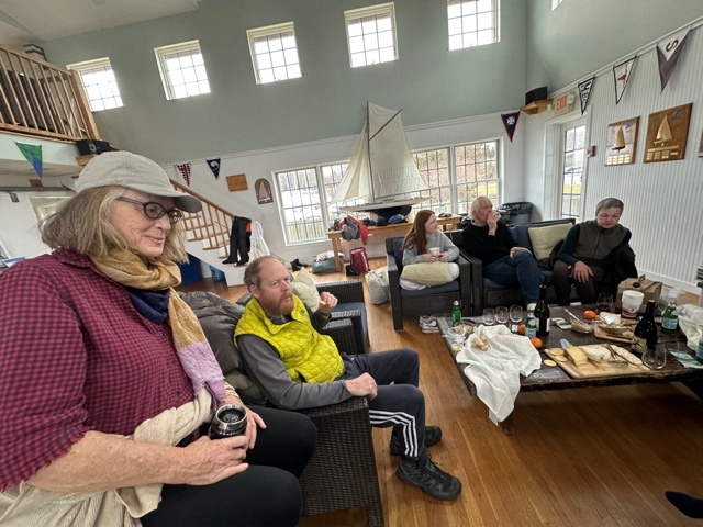 After sailing in some cold temperatures, the group likes to head back inside and enjoy some cheese, wine and a nice fire.    PAUL VOGEL