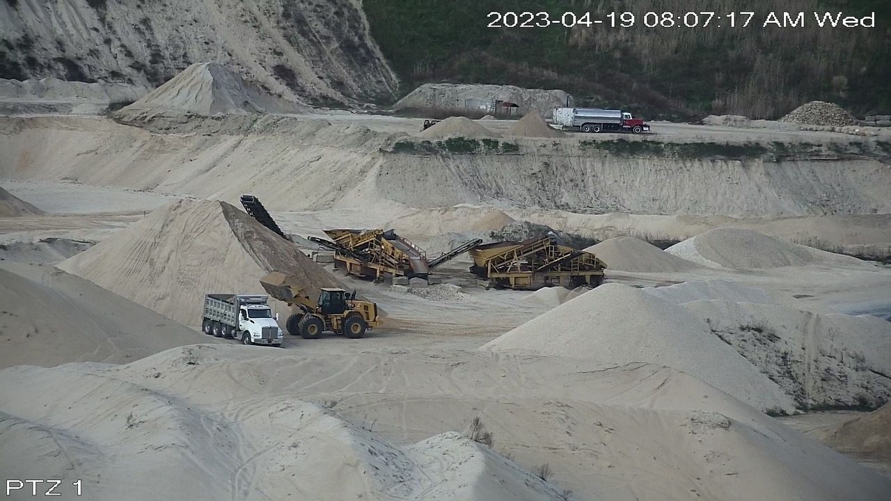 Surveillance cameras show that work continued at the Sand Land mine Wednesday morning, despite a notice of violation from the New York State Department of Environmental Conservation.
