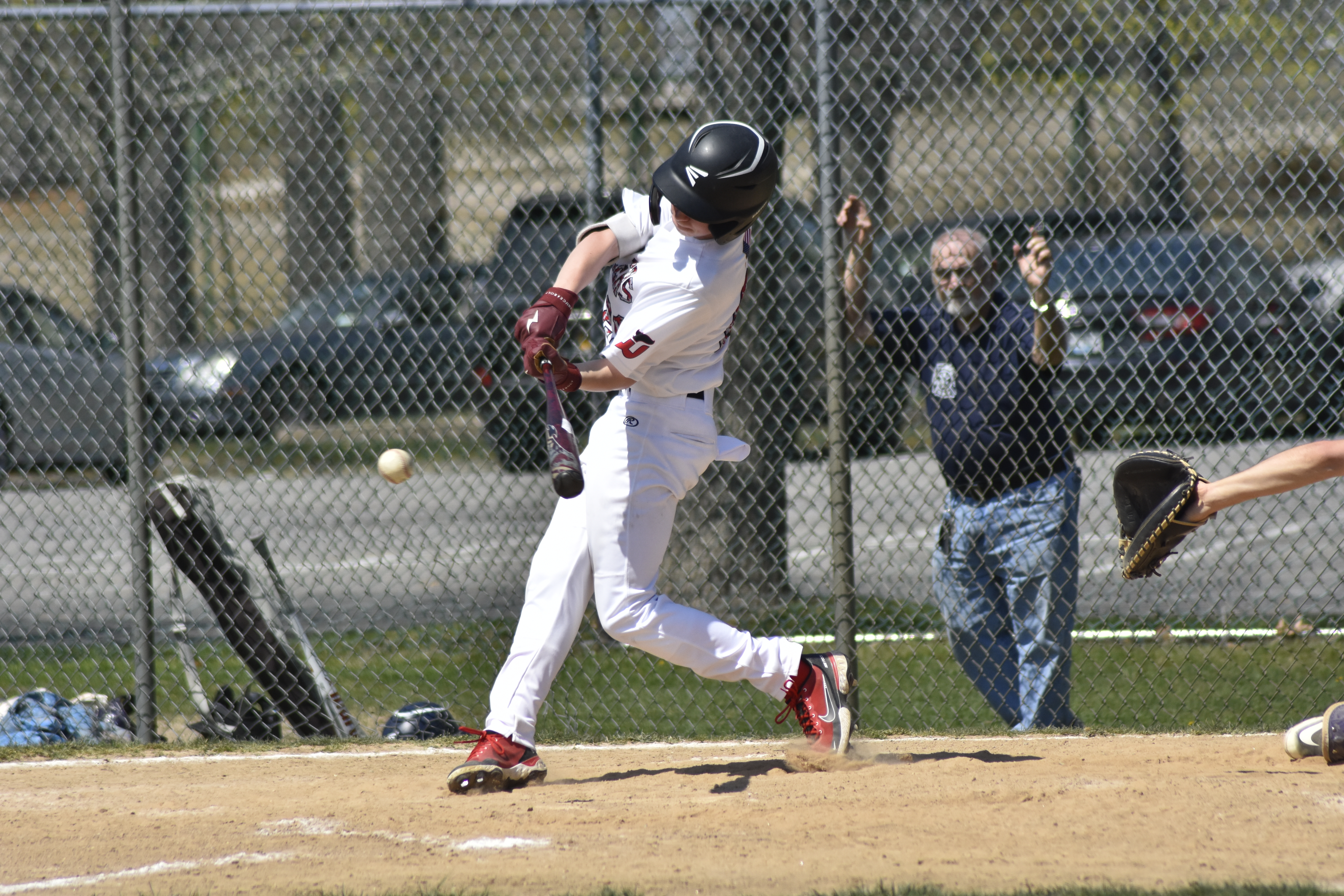 Pierson's Brian Schroeder lines a base hit into the outfield during Friday's home game against Greenport.    DREW BUDD