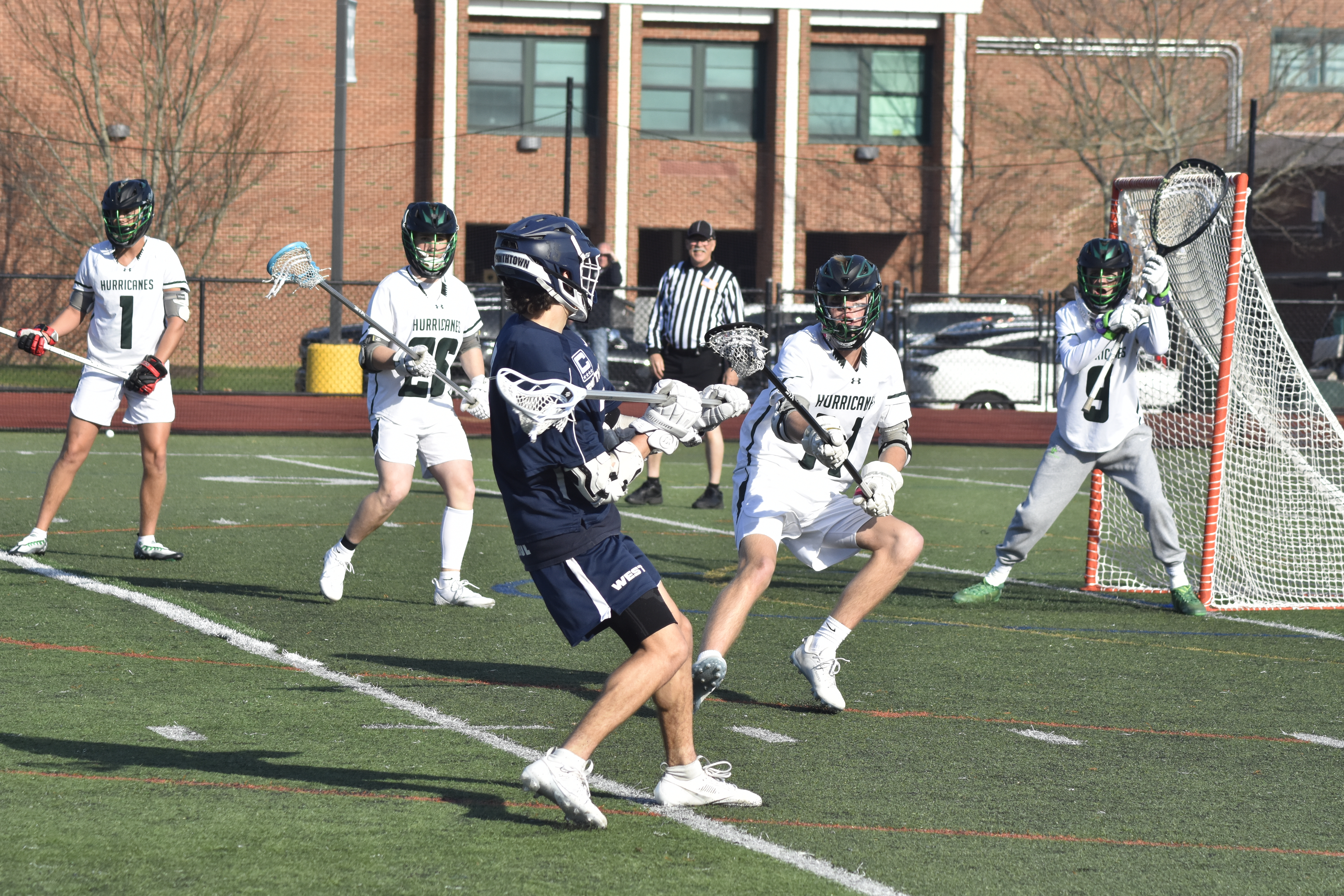 Westhampton Beach senior defender Avery Merrihew keeps an eye on a Smithtown West player.  DREW BUDD