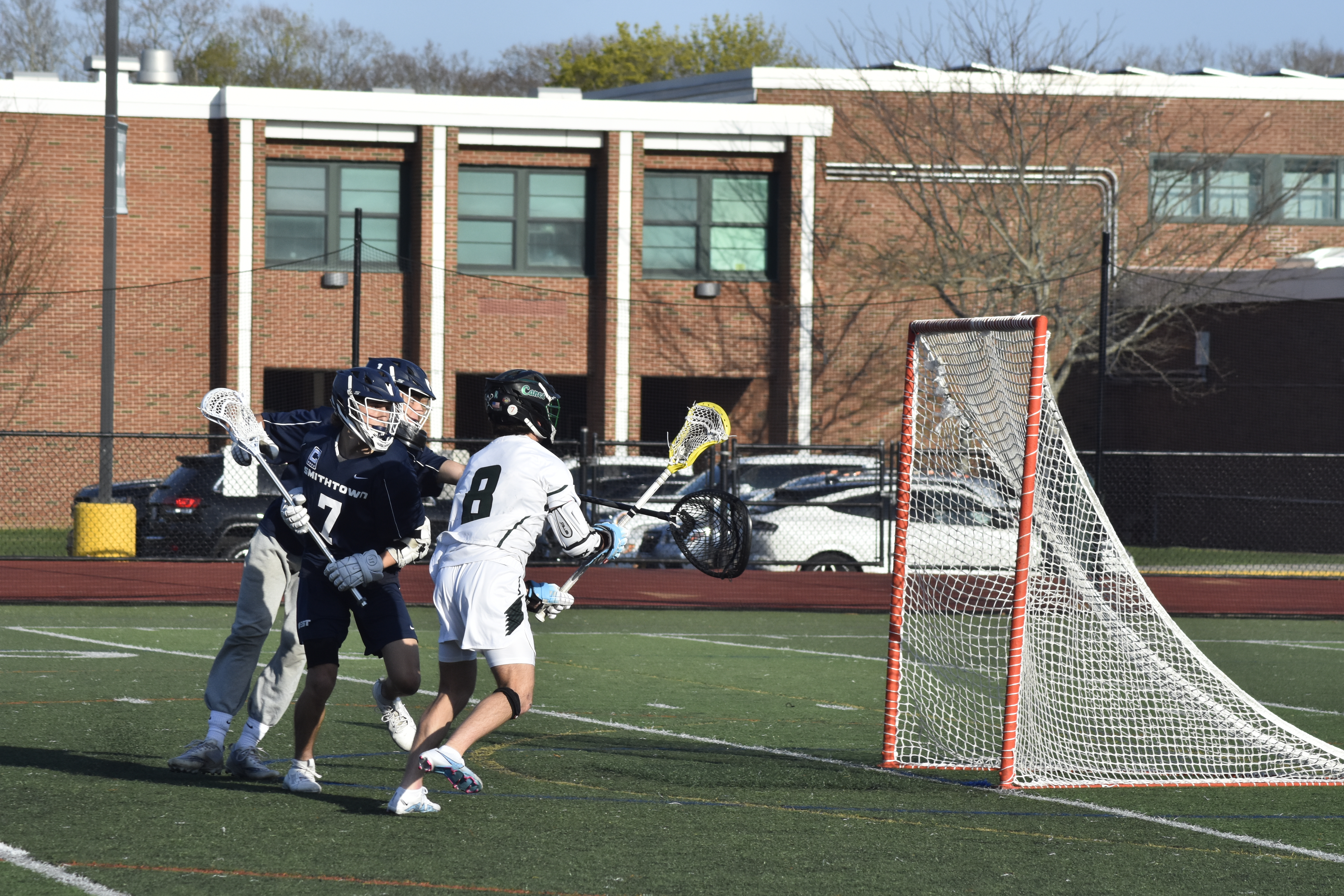 Westhampton Beach senior Morgan McEntee has a wide open goal and scores. He scored five goals and assisted on four others in Thursday's victory.  DREW BUDD