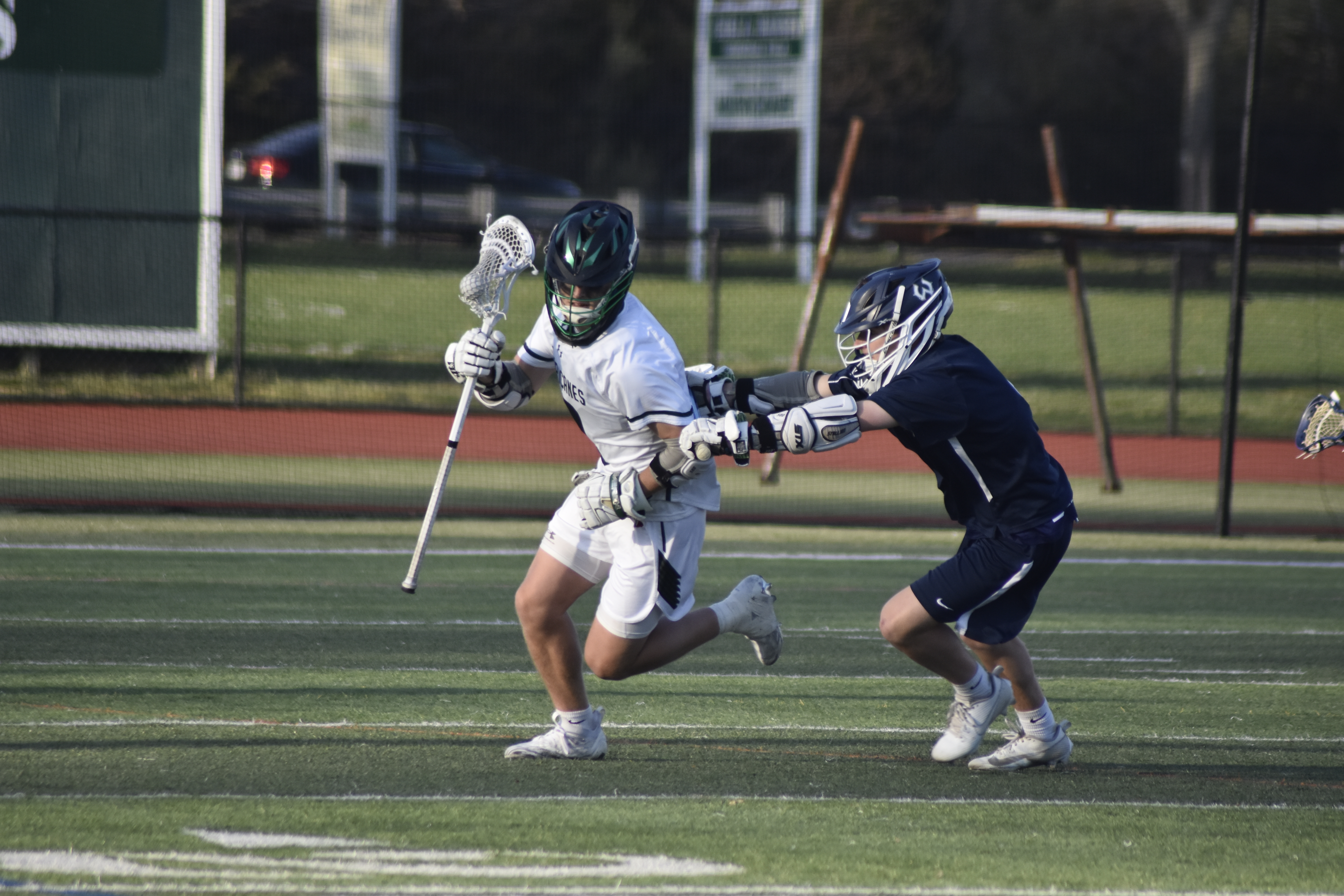 Westhampton Beach senior Chance Brindle grabs a loose ball in his team's defensive end.   DREW BUDD