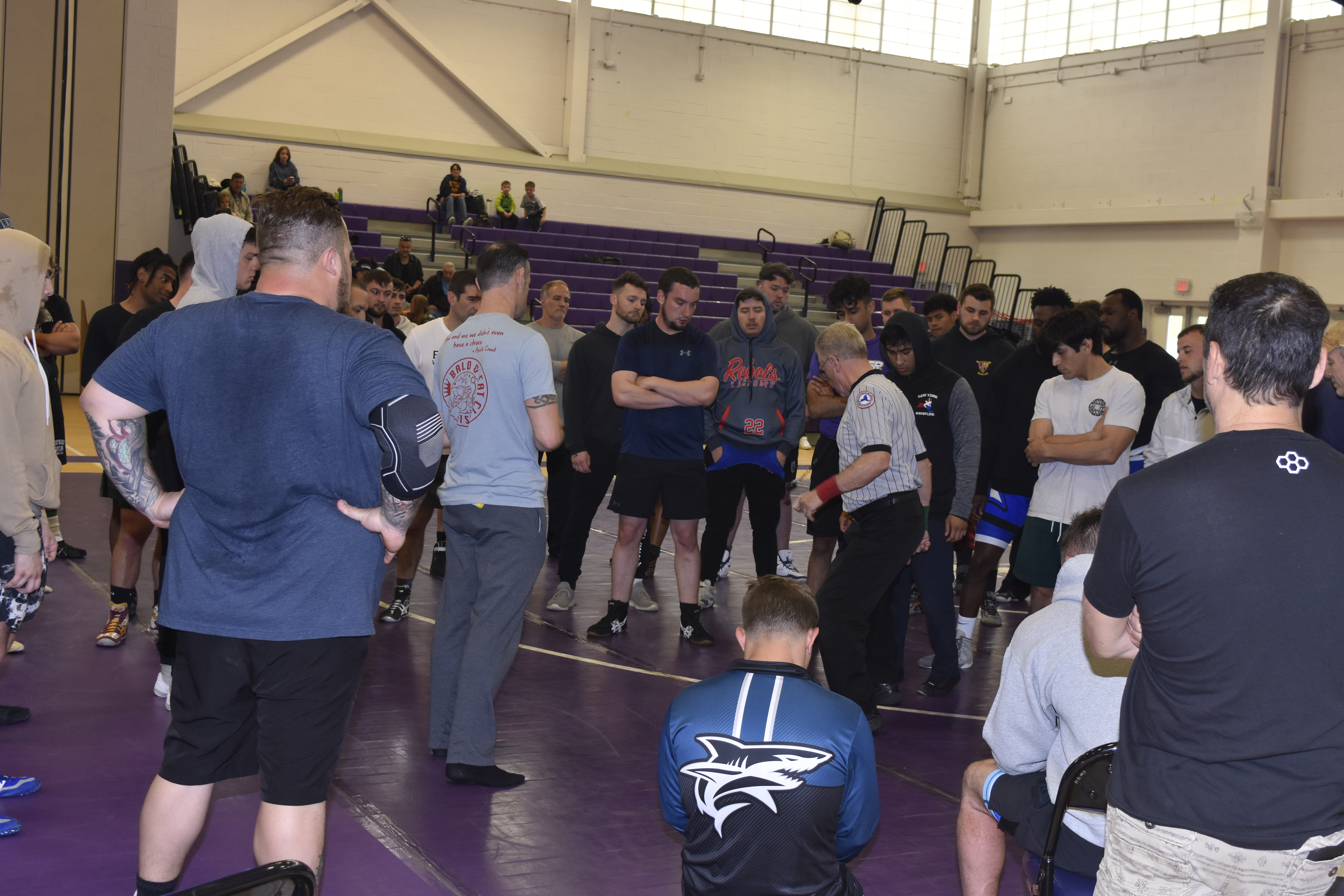 Going over the ground rules of the Bald and Fat Wrestling Classic just prior to the start at Hampton Bays Middle School on Saturday.  DREW BUDD